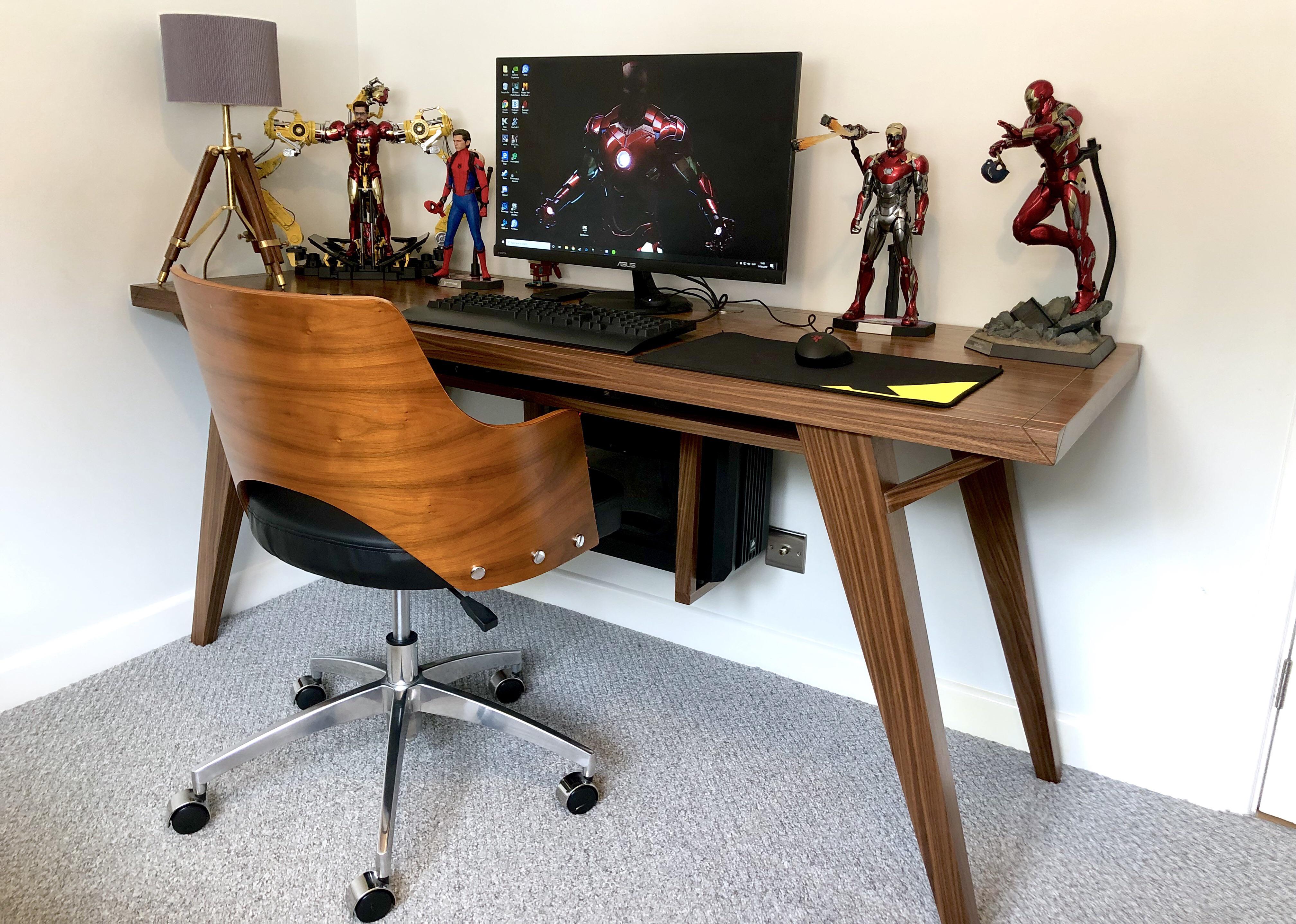Clean, simple and full of Marvel [OC] desk I just finished in walnut