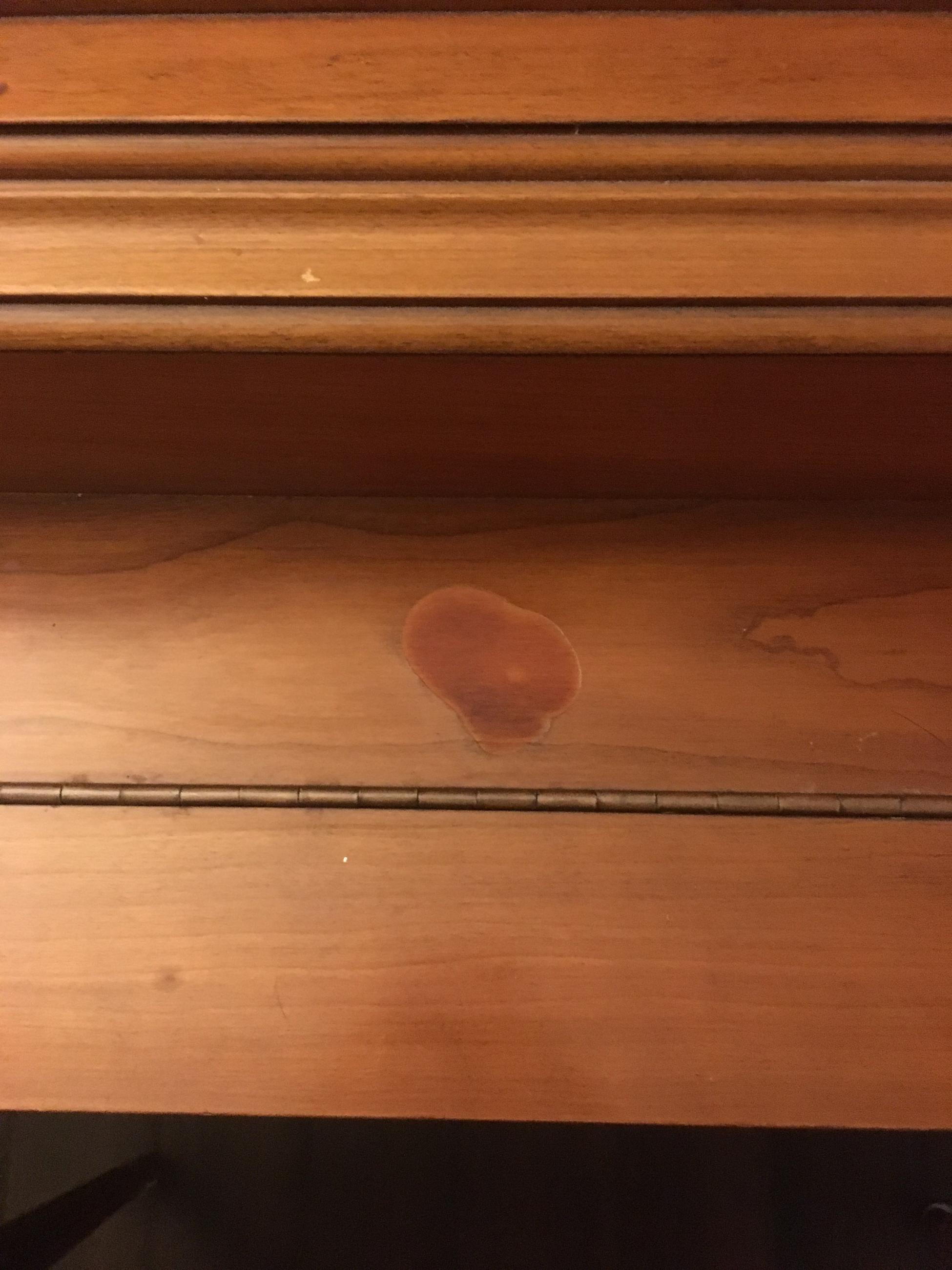Any idea on how to fix an essential oil spill on an antique piano? r