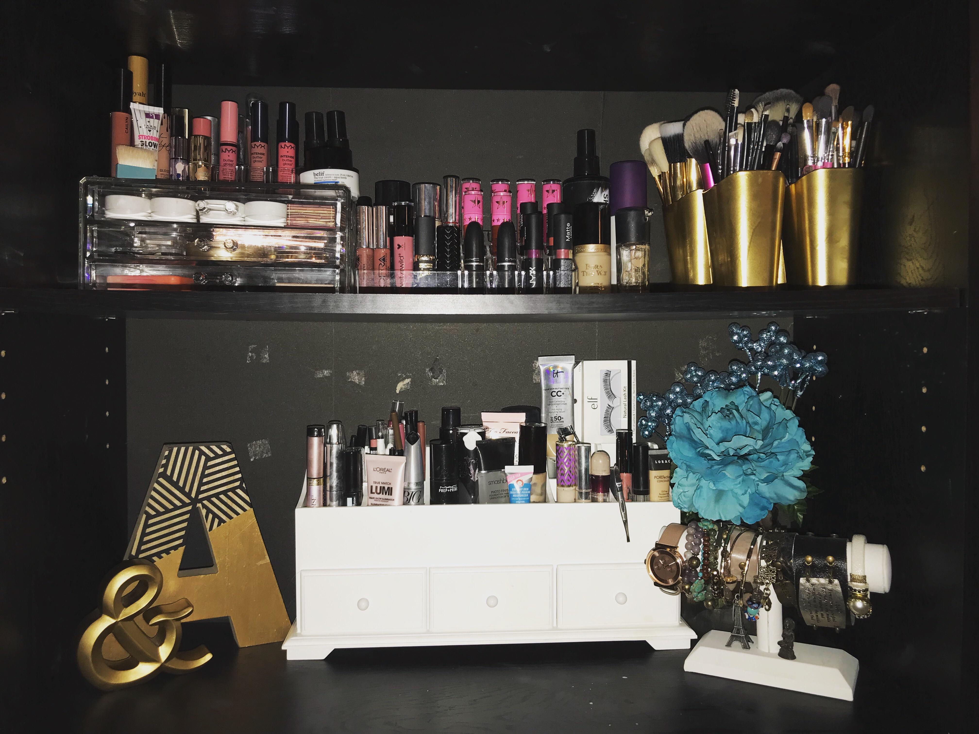 Redecorated our bookshelf into my make up storage.