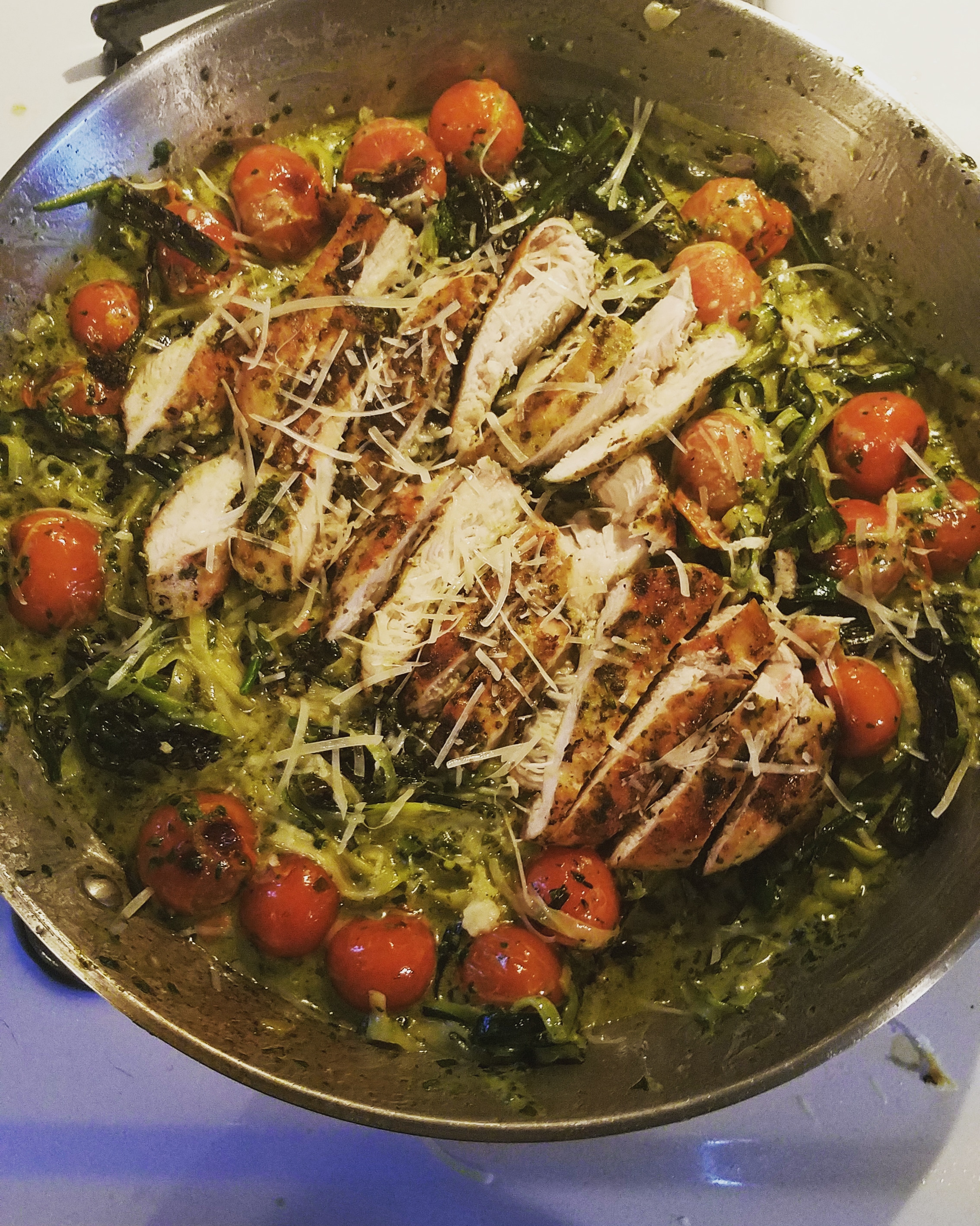 Favorite meal so far pesto alfredo zoodles, with roasted tomatoes