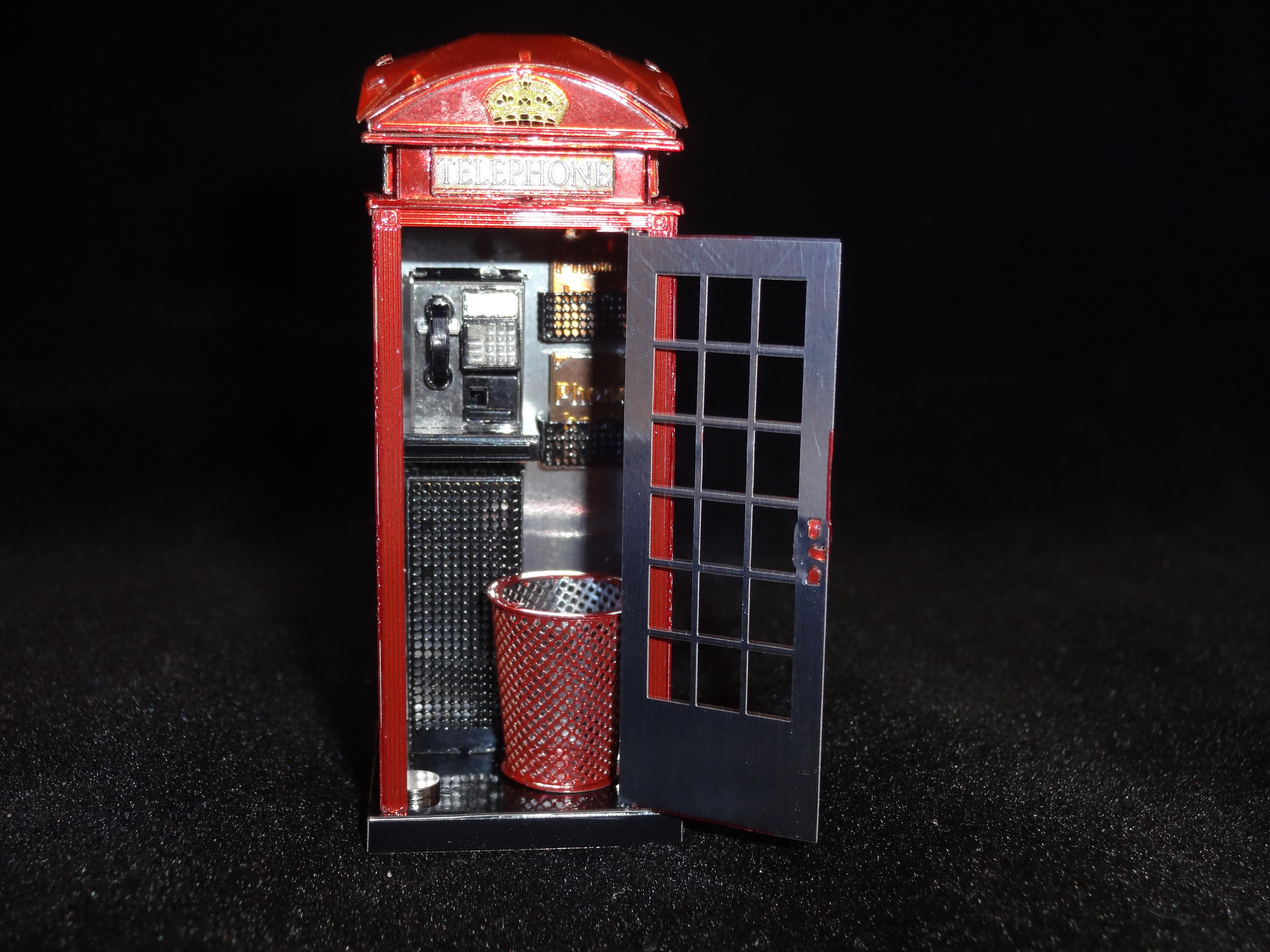 London Telephone Booth, 1" x 1" x 2 3/4". Inside is a pay telephone