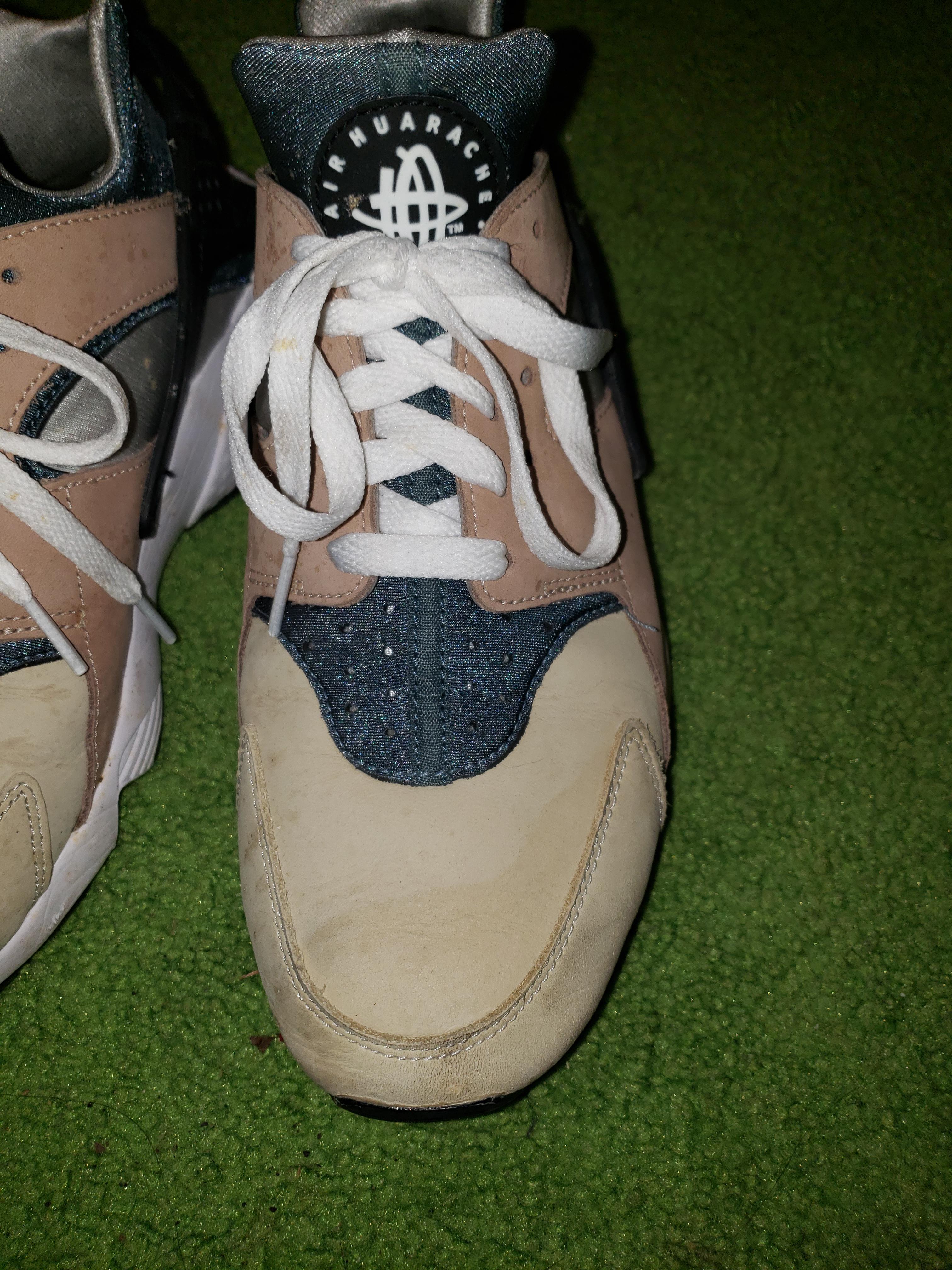 Cleaned an oil stain with soapy water, left a water stain on the front