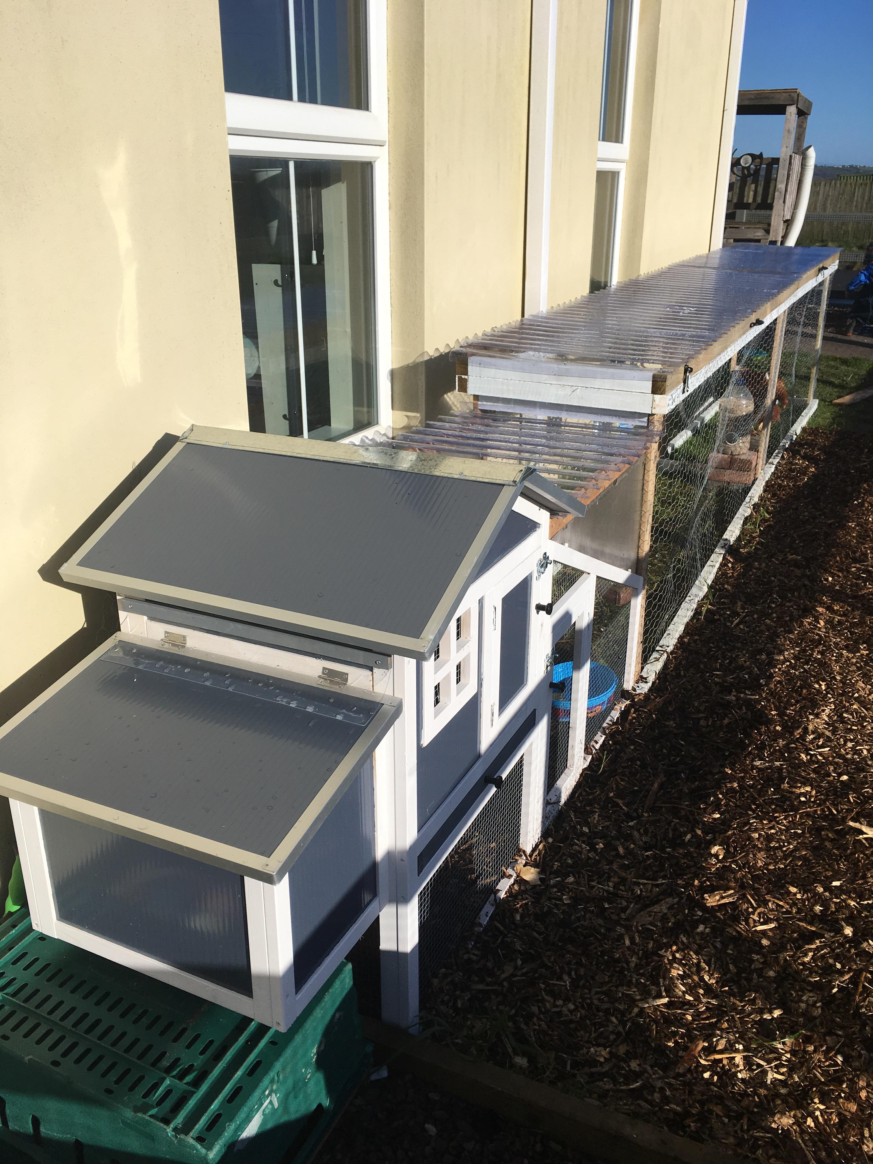 My DIY chicken run attached to my bought coop the roof of the run is on