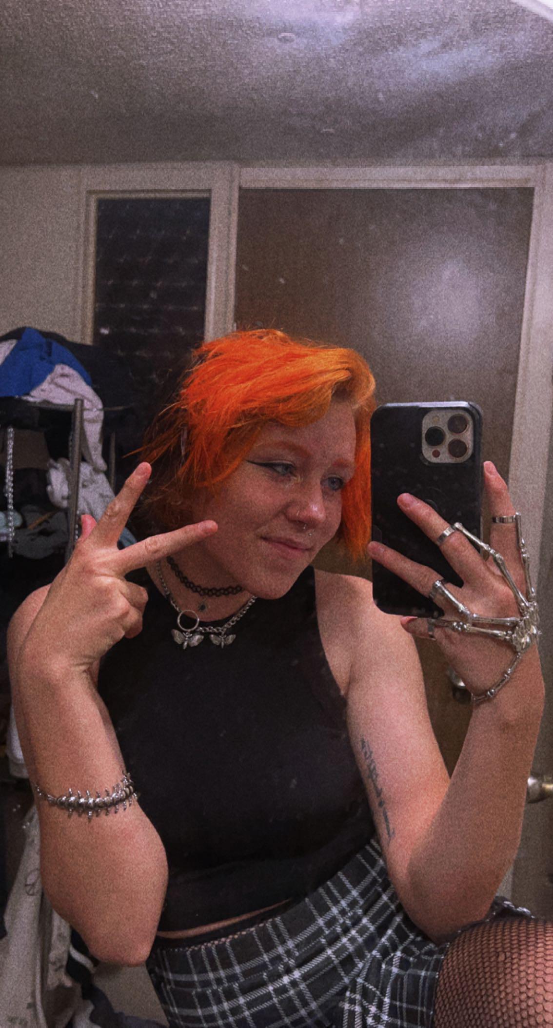 Just, me and my orange hair for Halloween; trying to be spooky 👻 r