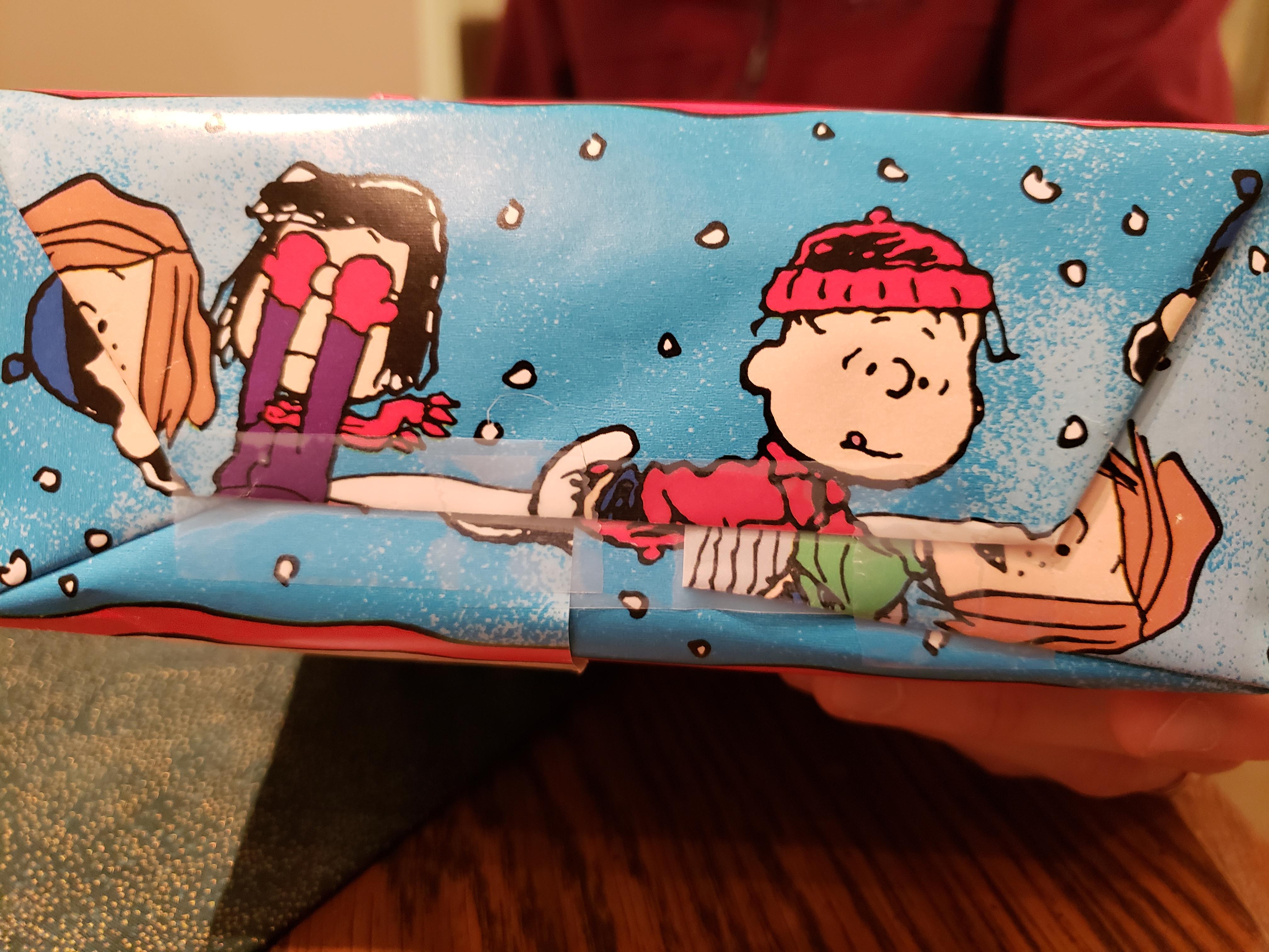 Gift I received...wrapped in a such a way that it appears as if Linus and Patty are getting it