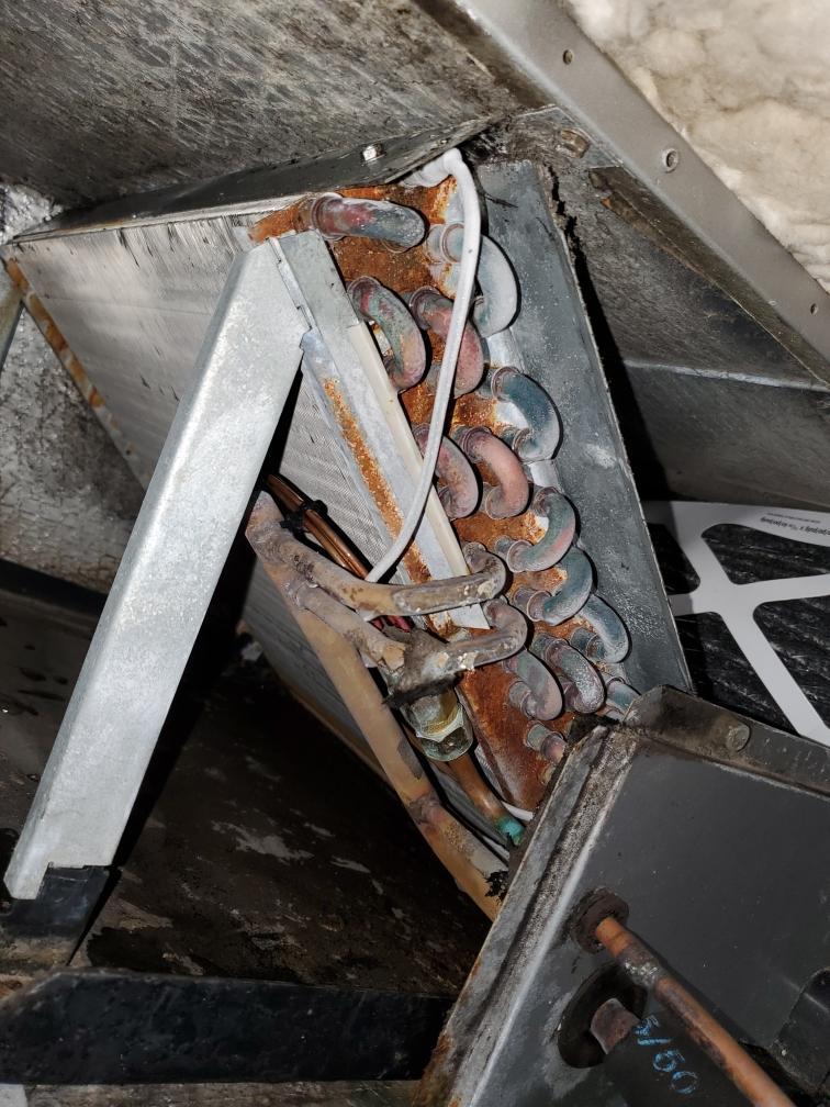 Rusted coil. Anything I can to to remove and prevent furthur rust to