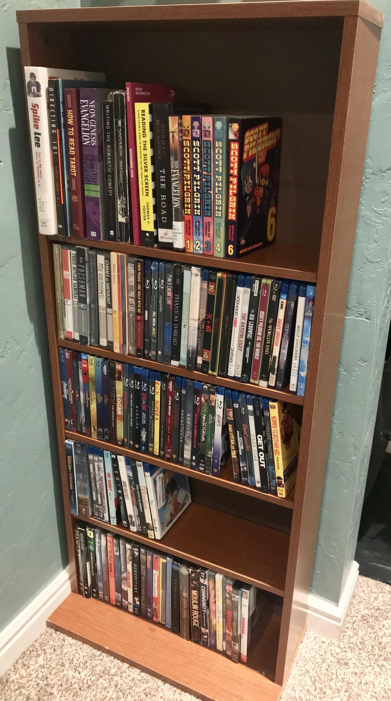 I finally got a bookcase for my movies (and my tobe read stack)! r/dvdcollection