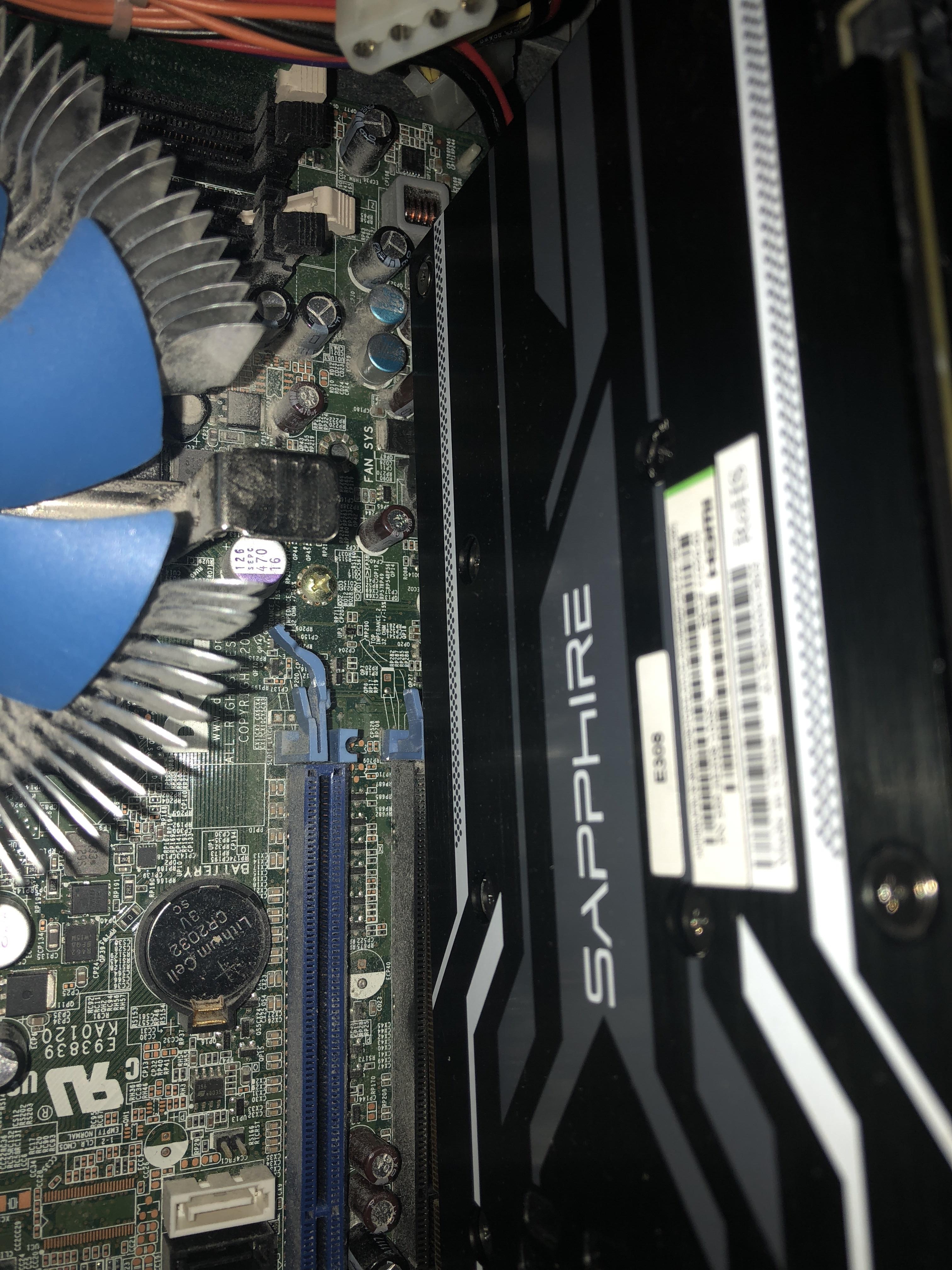 GPU stuck in slot. GPU release button stuck underneath GPU. r