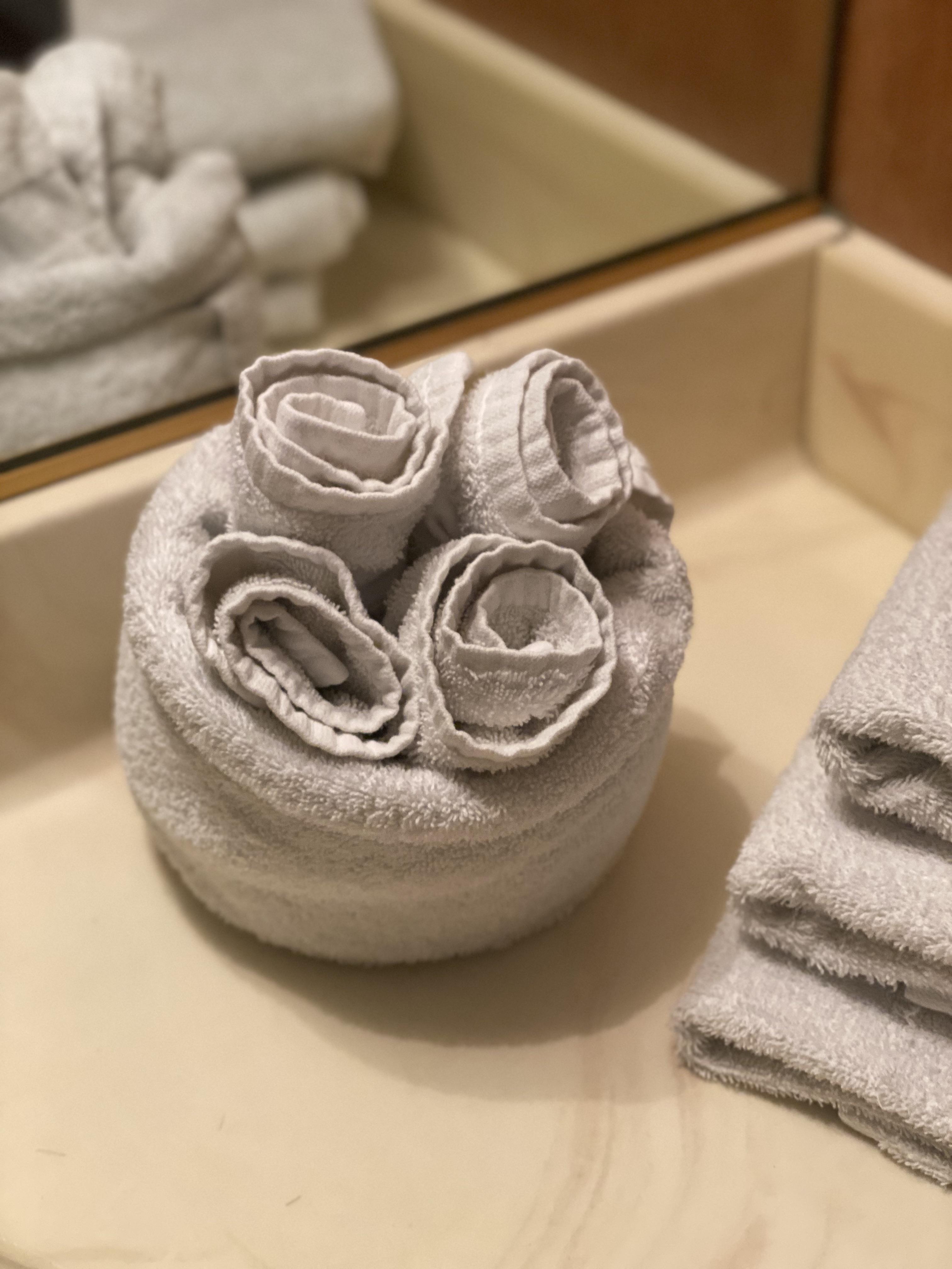 Sometimes I try to elaborately arrange face towels to get a fancy hotel