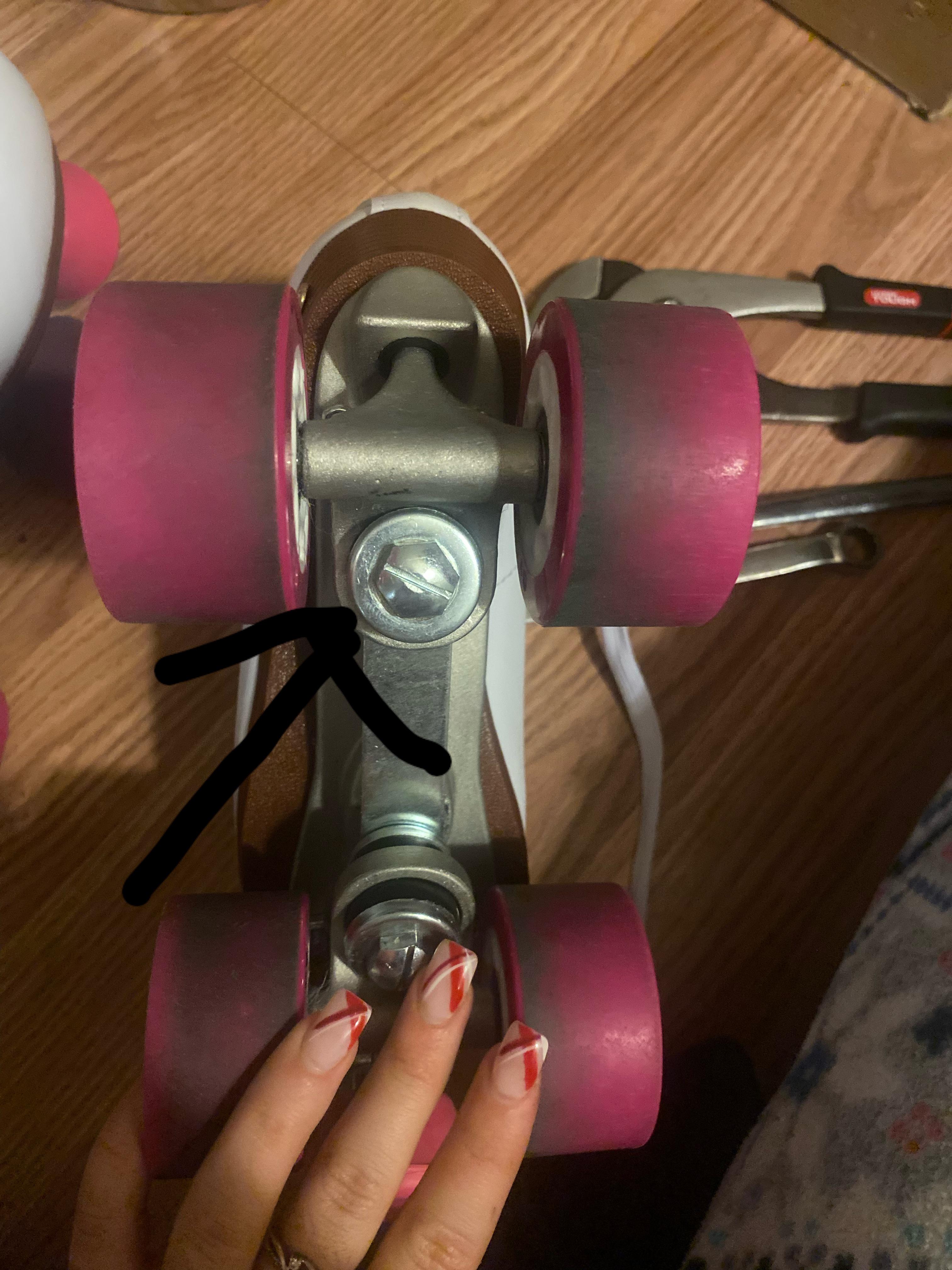 How do I loosen this part outside of the nut? The nut won’t seem to