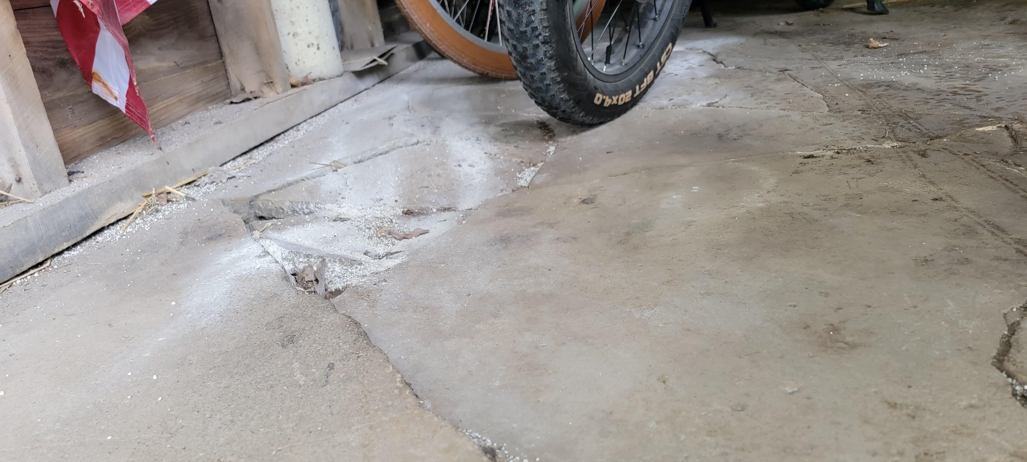 Old Cracked Shed Floor. Do I just put some type of new concrete over