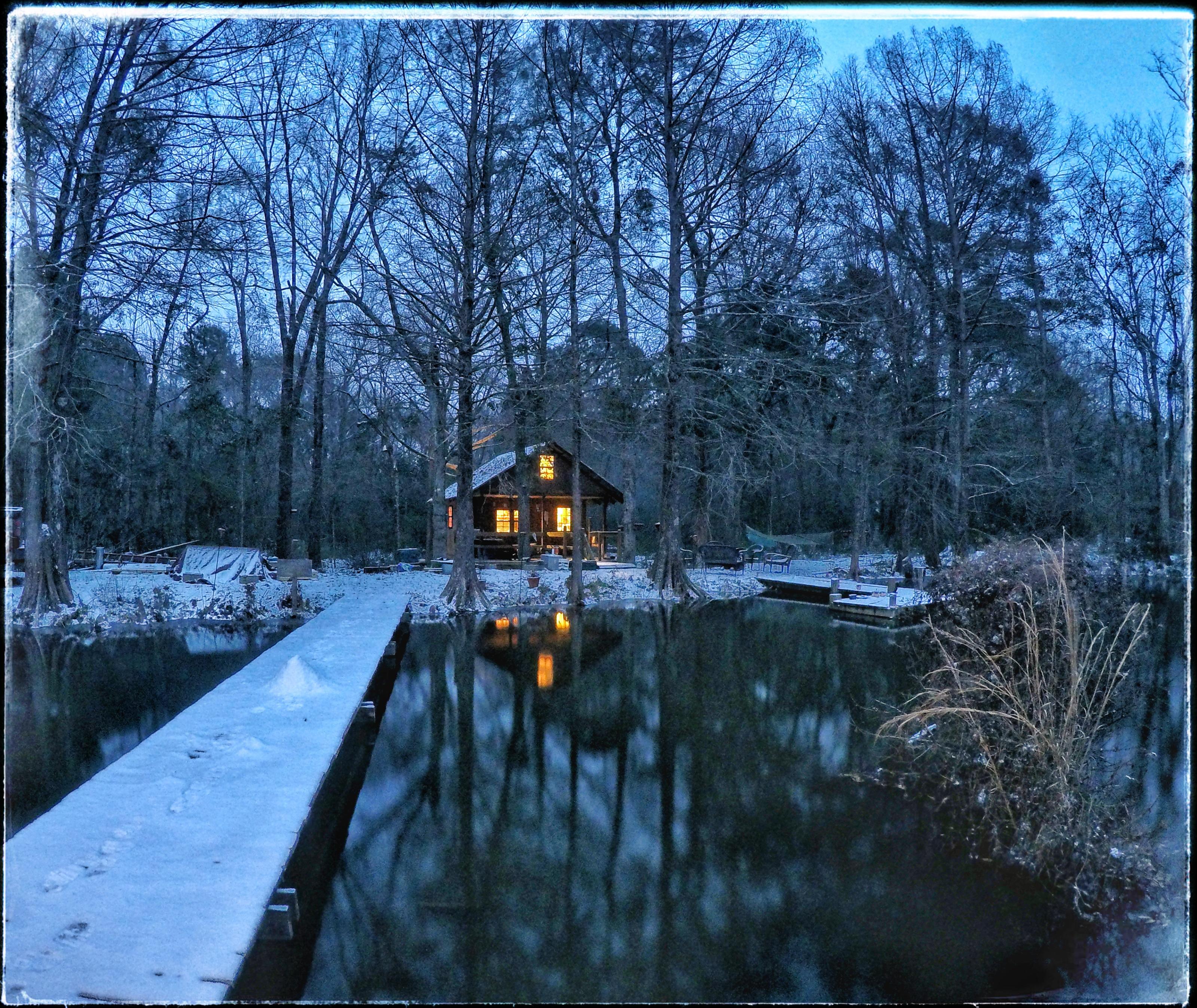 My camp covered in rare Louisiana snow. r/CozyPlaces
