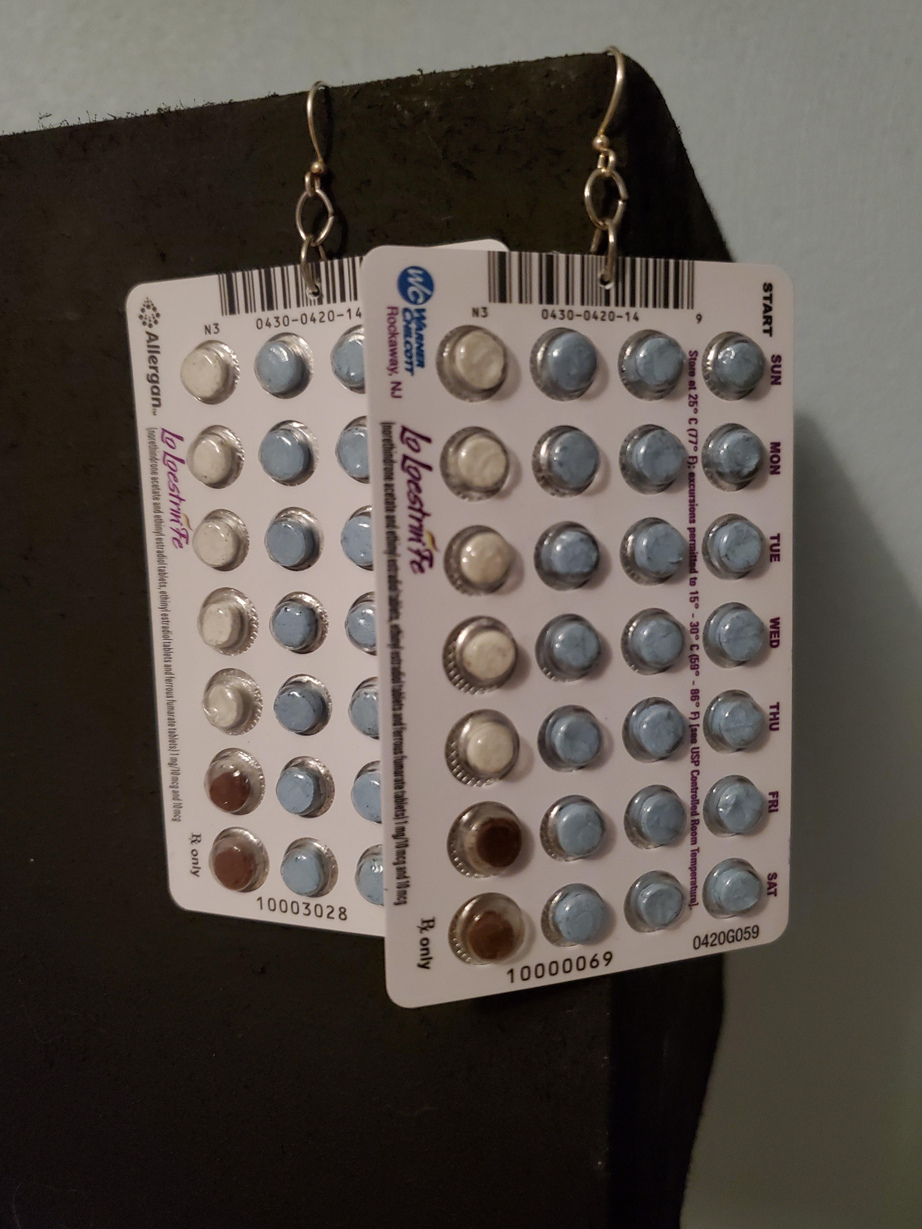 Made some earrings out of my used birth control packs with polymer clay