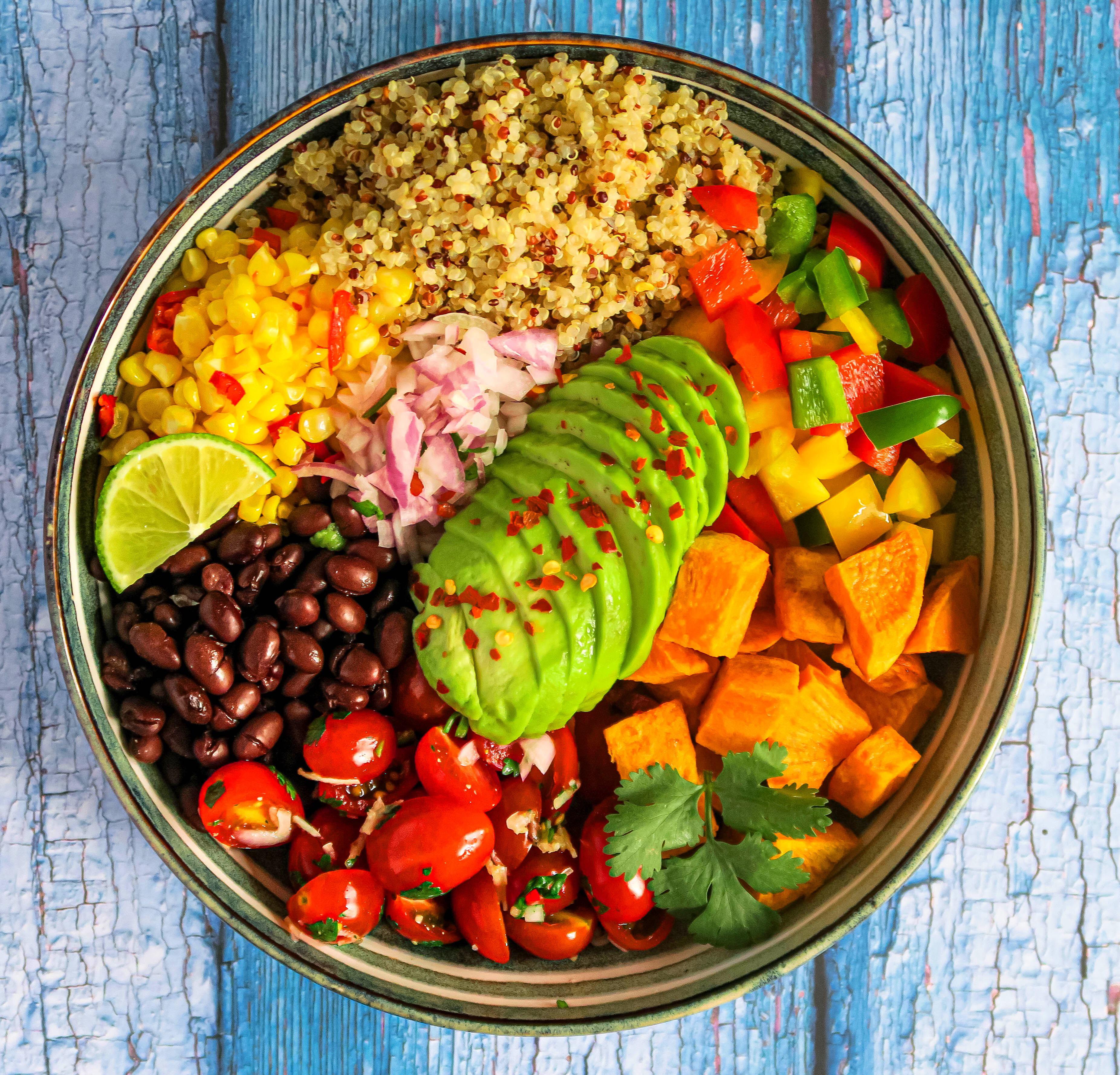 [Homemade] quinoa salad with sweet potato, beans, peppers, spicy corn