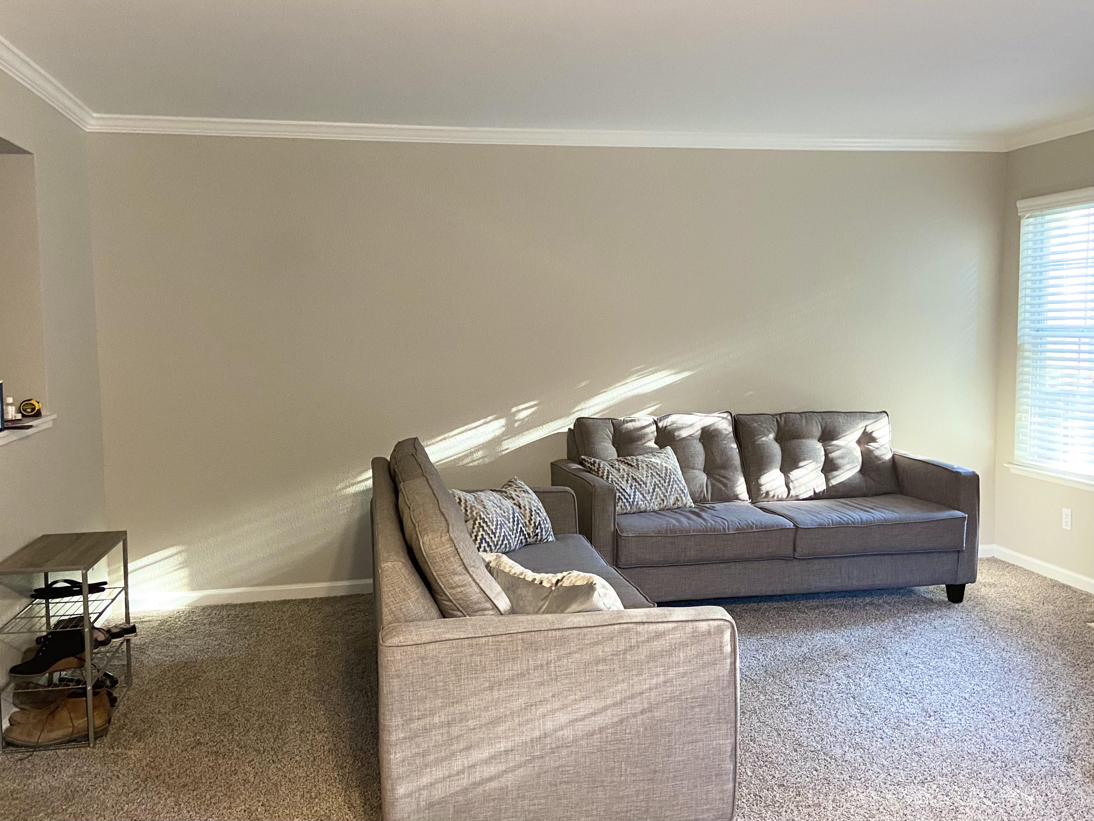 How do I decorate this room since the couches are not placed against