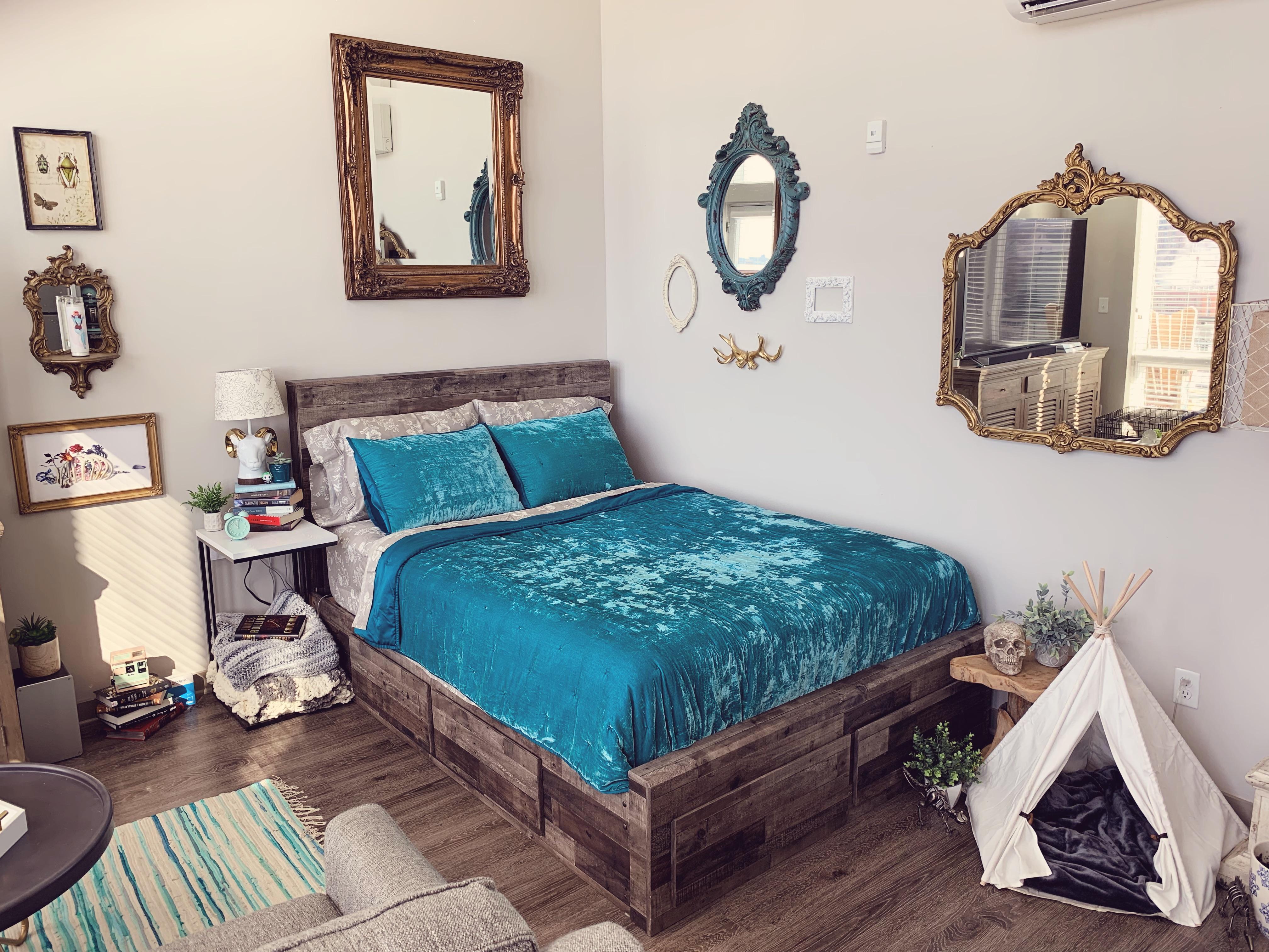 I decorated the “bedroom” of my studio with antique mirrors from