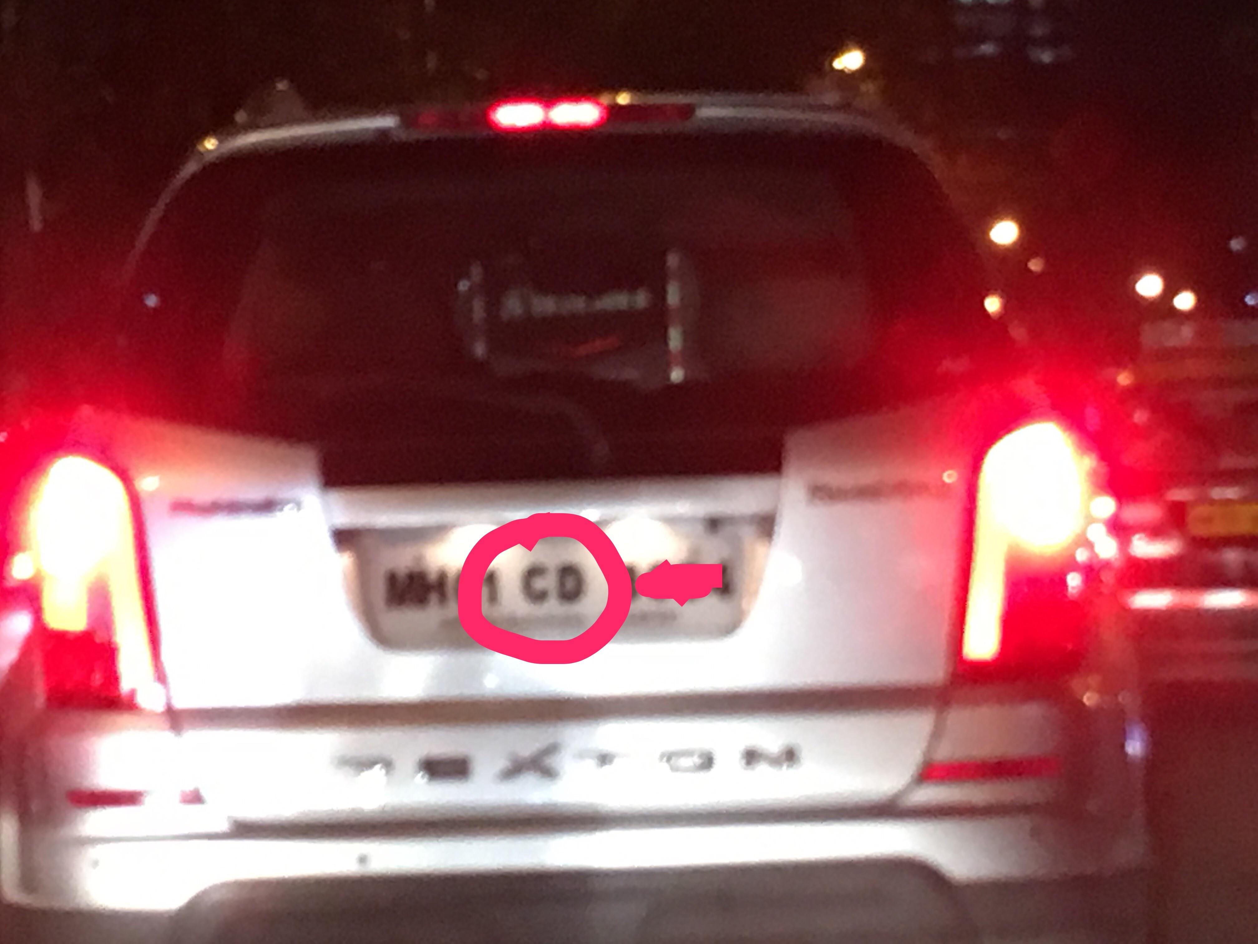 Does an MH license plate with 'CD' or 'CC' in it like this one