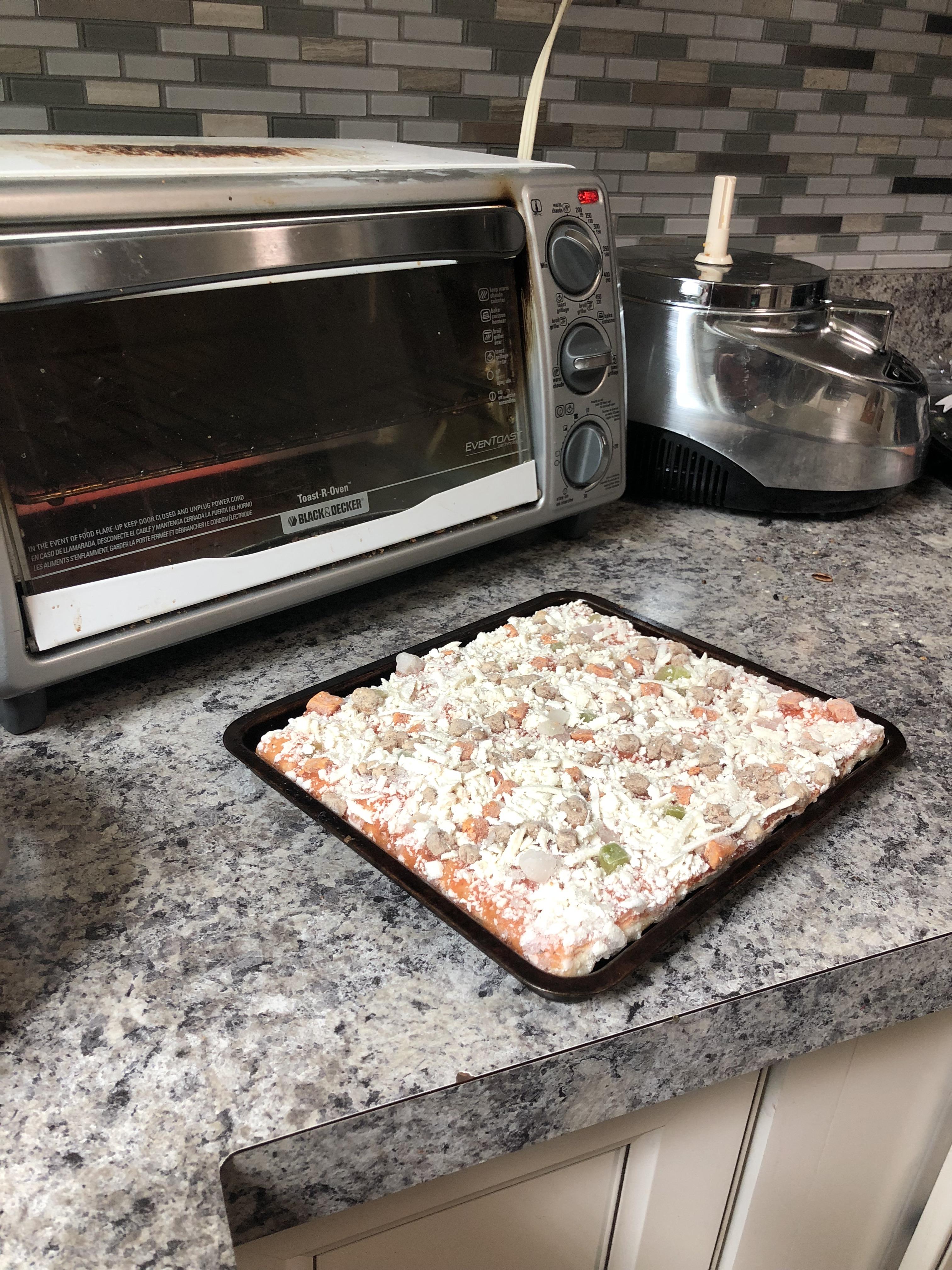 It’s like my toaster oven tray was made for this Totino’s pizza. r