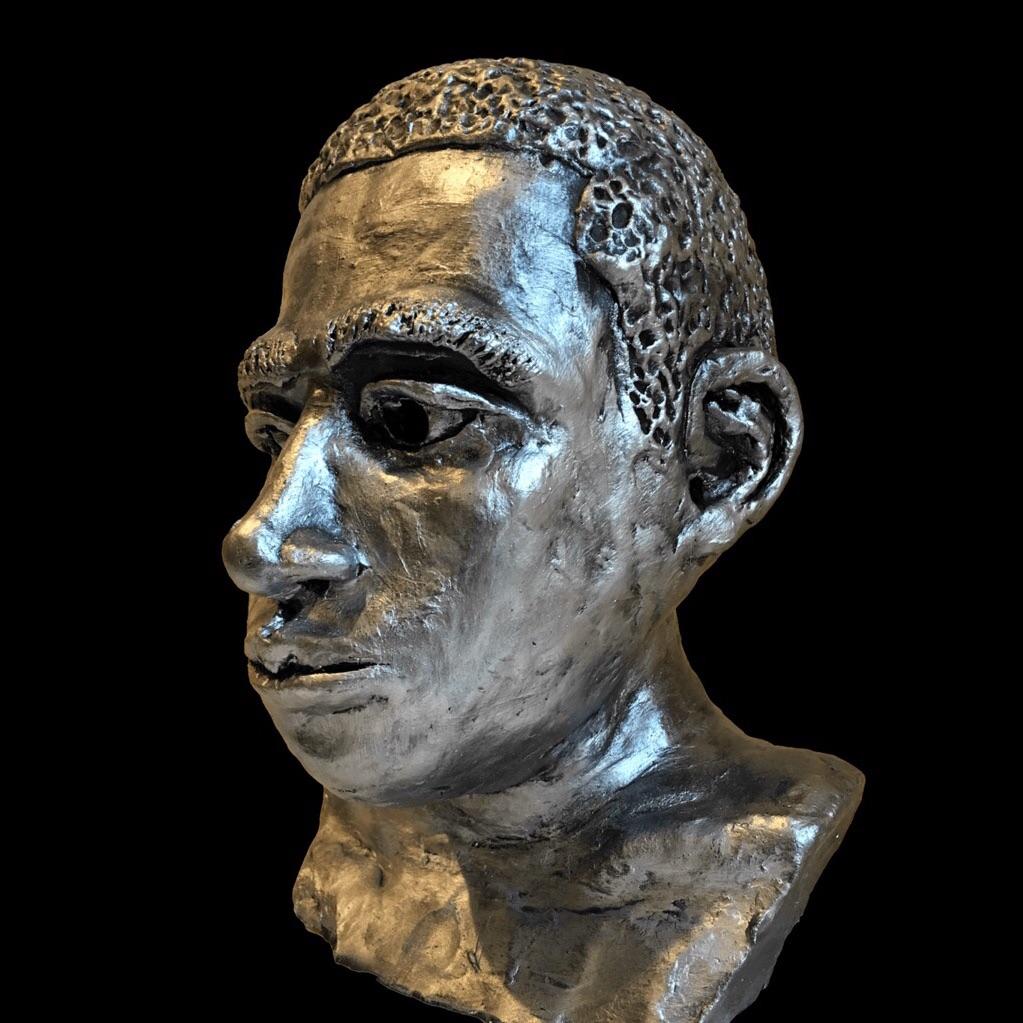 My very first sculpture in high school A Young JayZ Clay/13” r