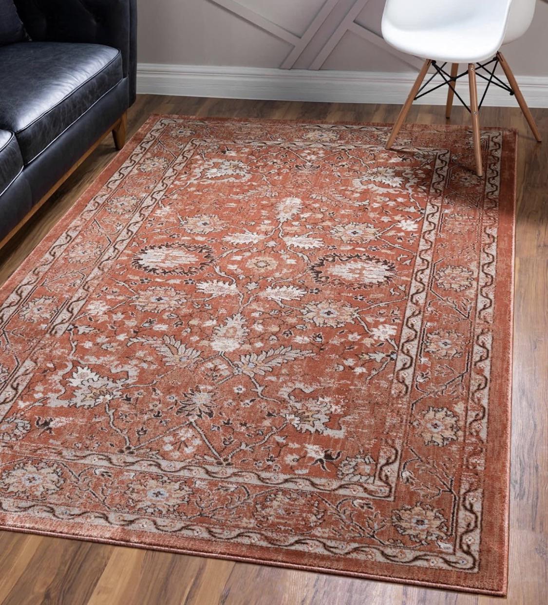 Our living room is large, roughly 18x36. We currently have this 8x10