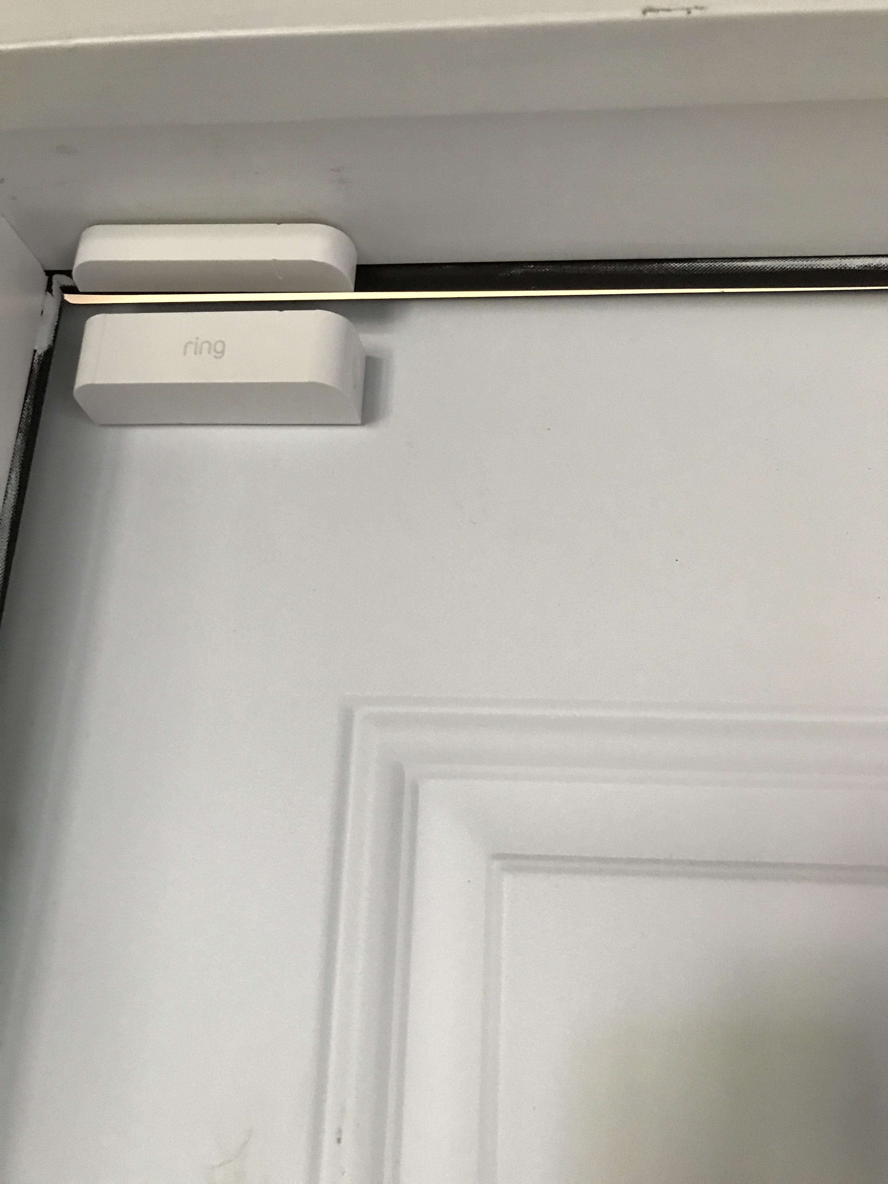 Door is hanging low on the knob side of the door creating this gap at