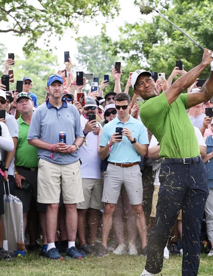 No phone, just a man enjoying Tiger and a beer r/golf