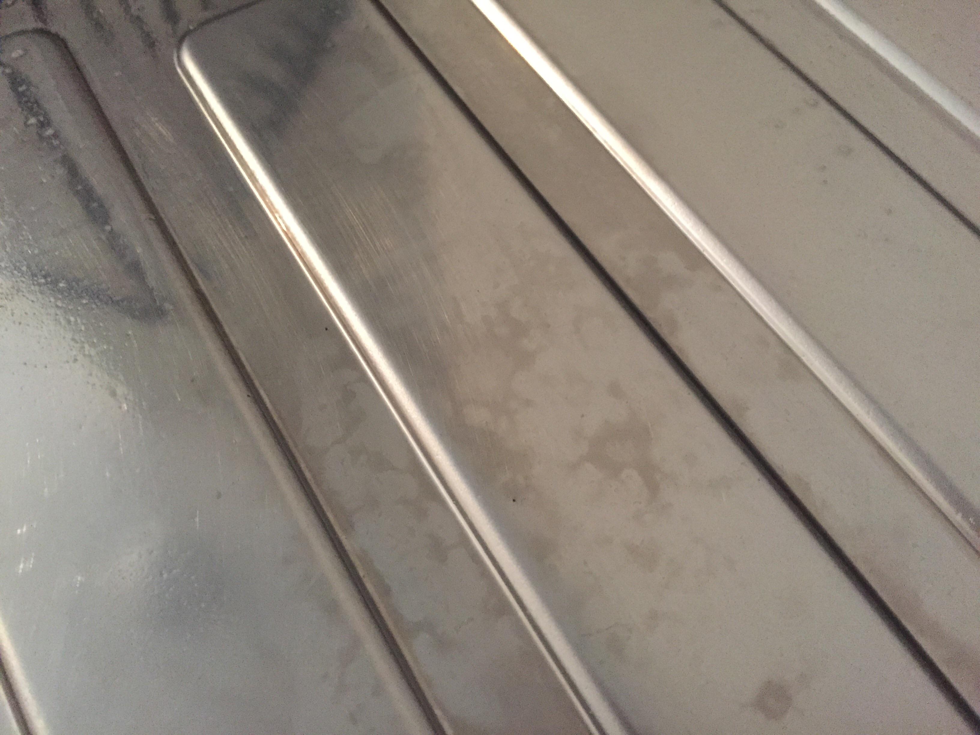Stainless steel sink stain what is it? I've had these stains building