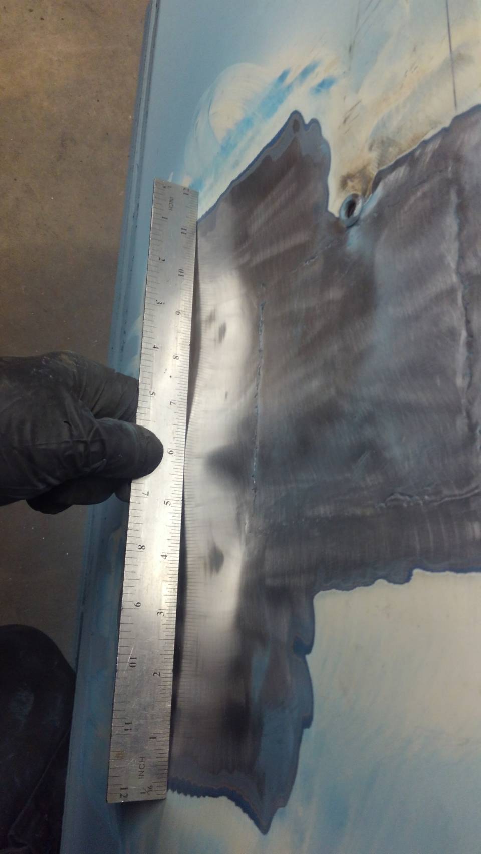 Door warped while welding in a patch panel. Whats a good way to get it