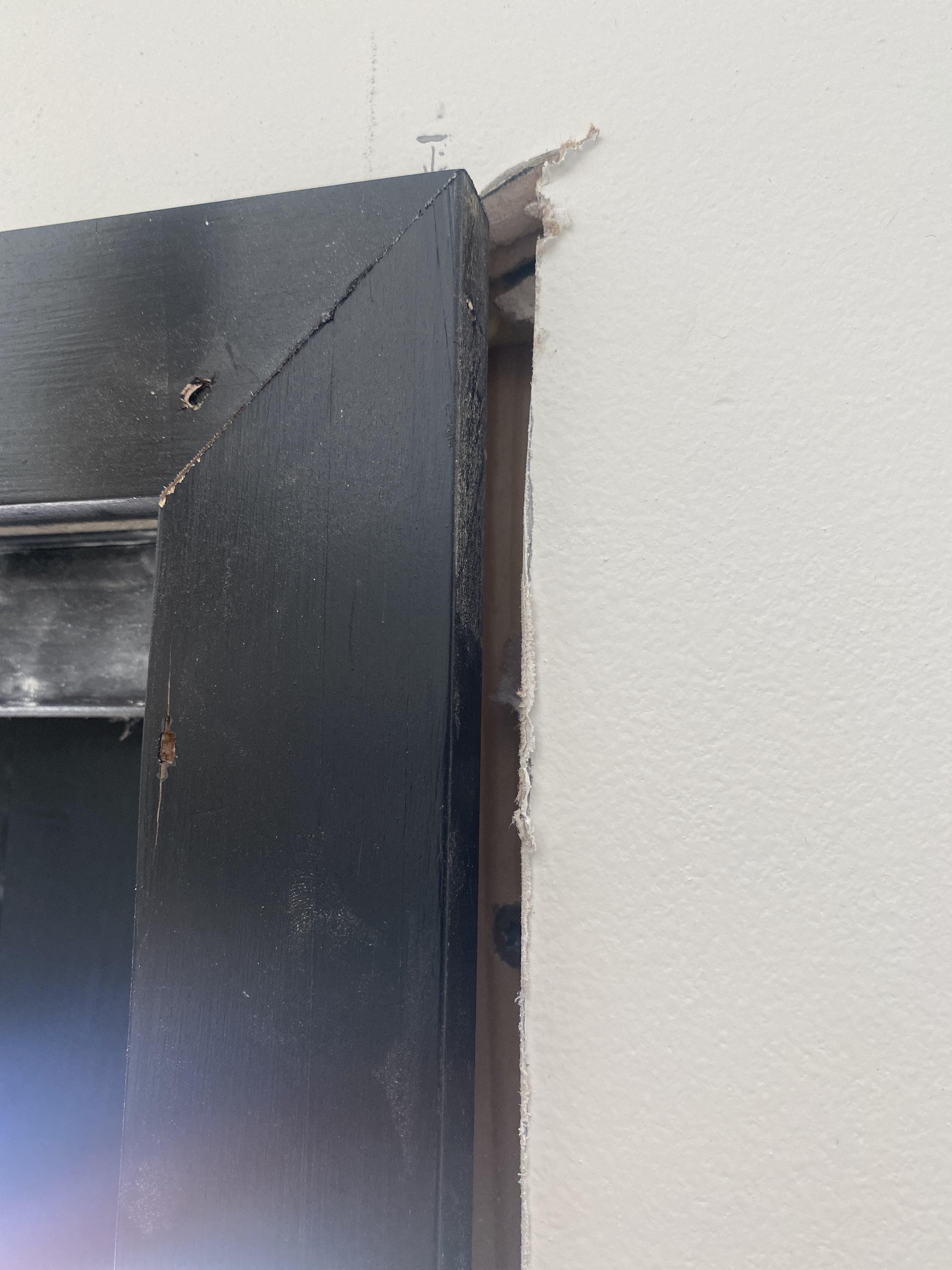 Over cut drywall at door wall casing r/drywall