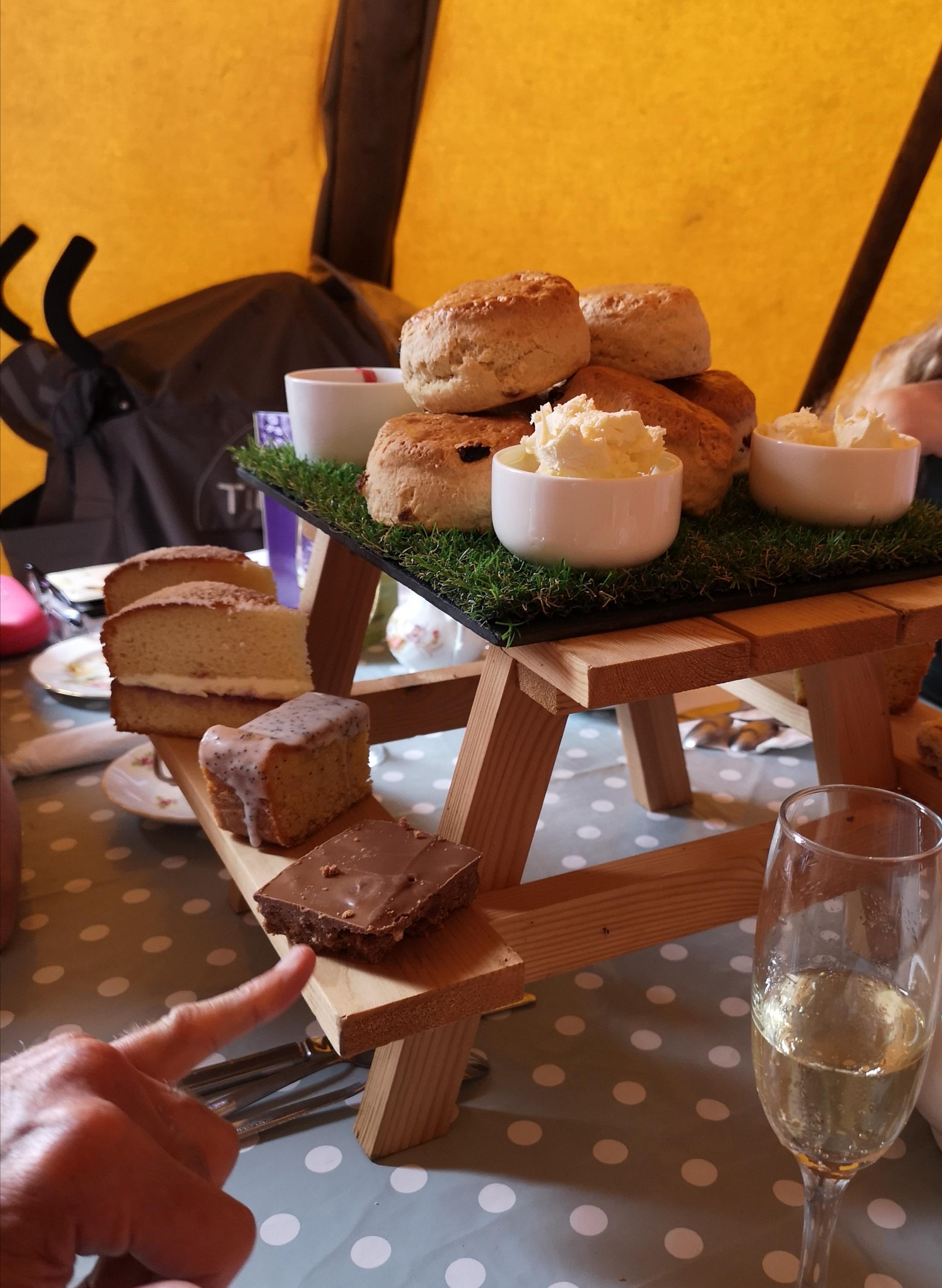 Afternoon Tea on a picnic table.. WeWantPlates
