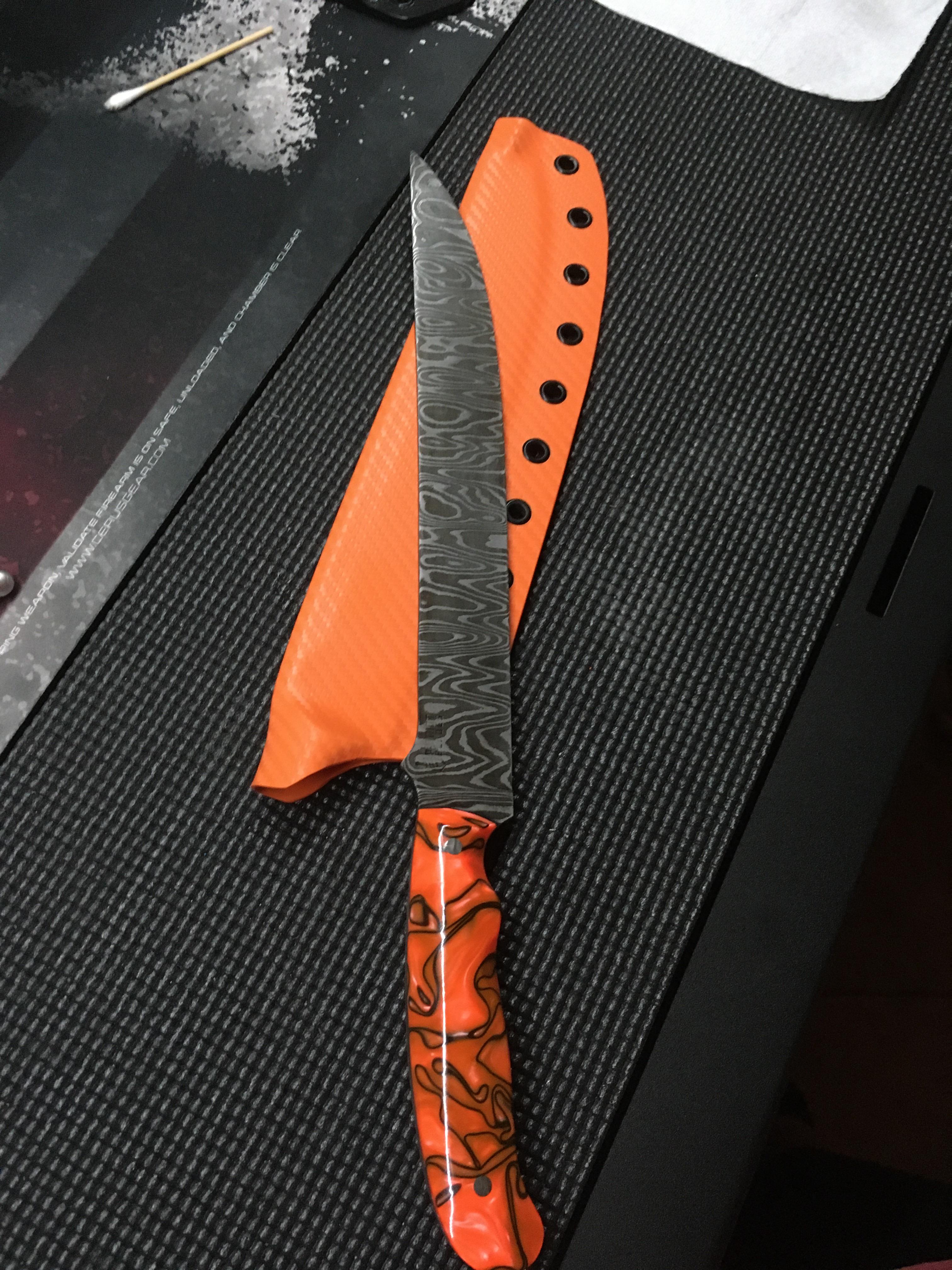 Damascus brisket knife finished up and ready for the customer r