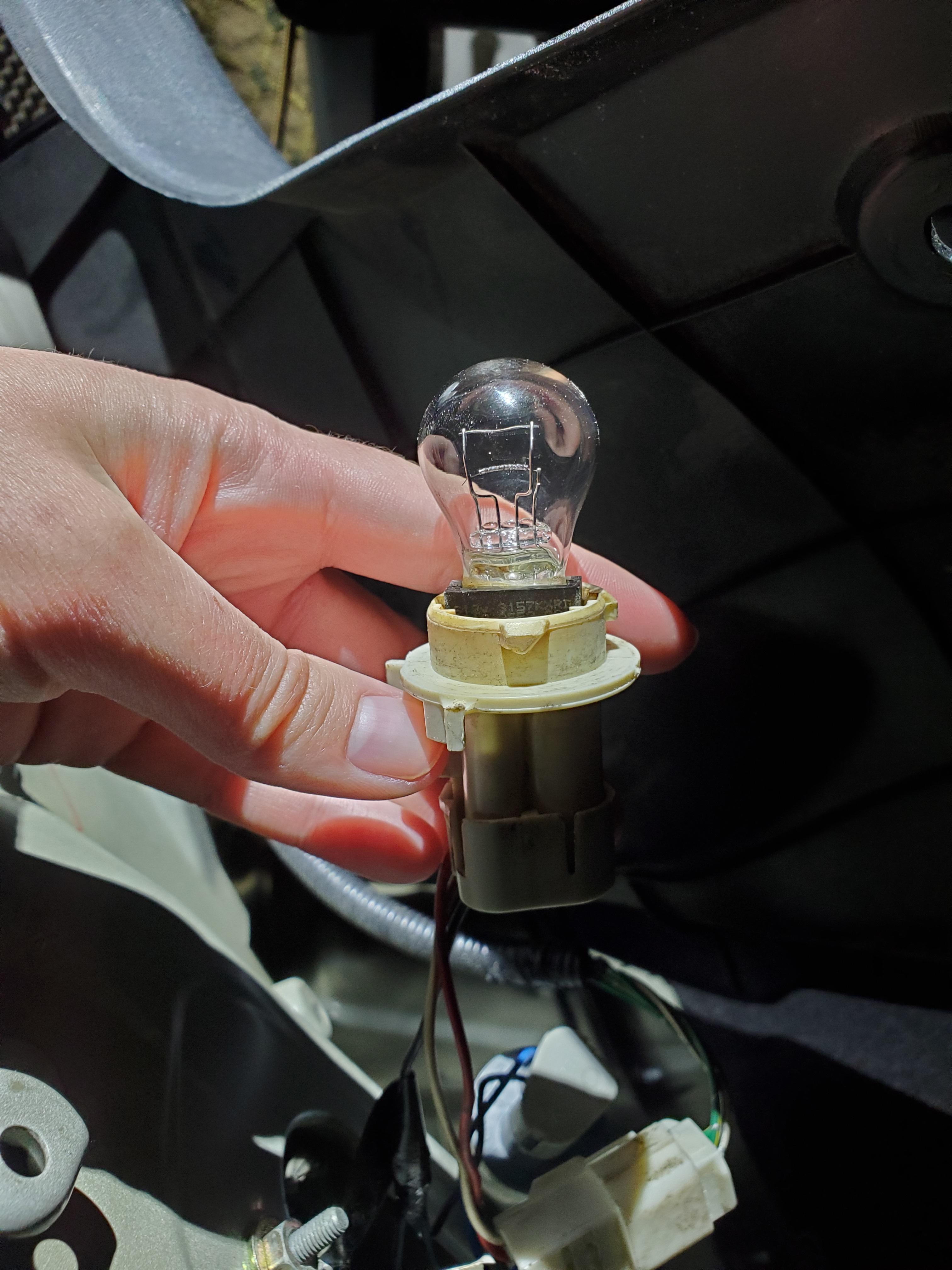 Got a 99 camry and trouble changing tail brake light. Won't come out of