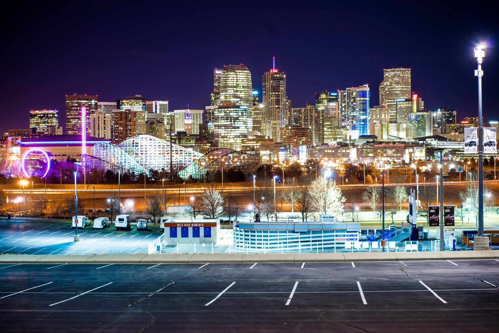 Downtown from Mile High Stadium parking lot last night. r/Denver