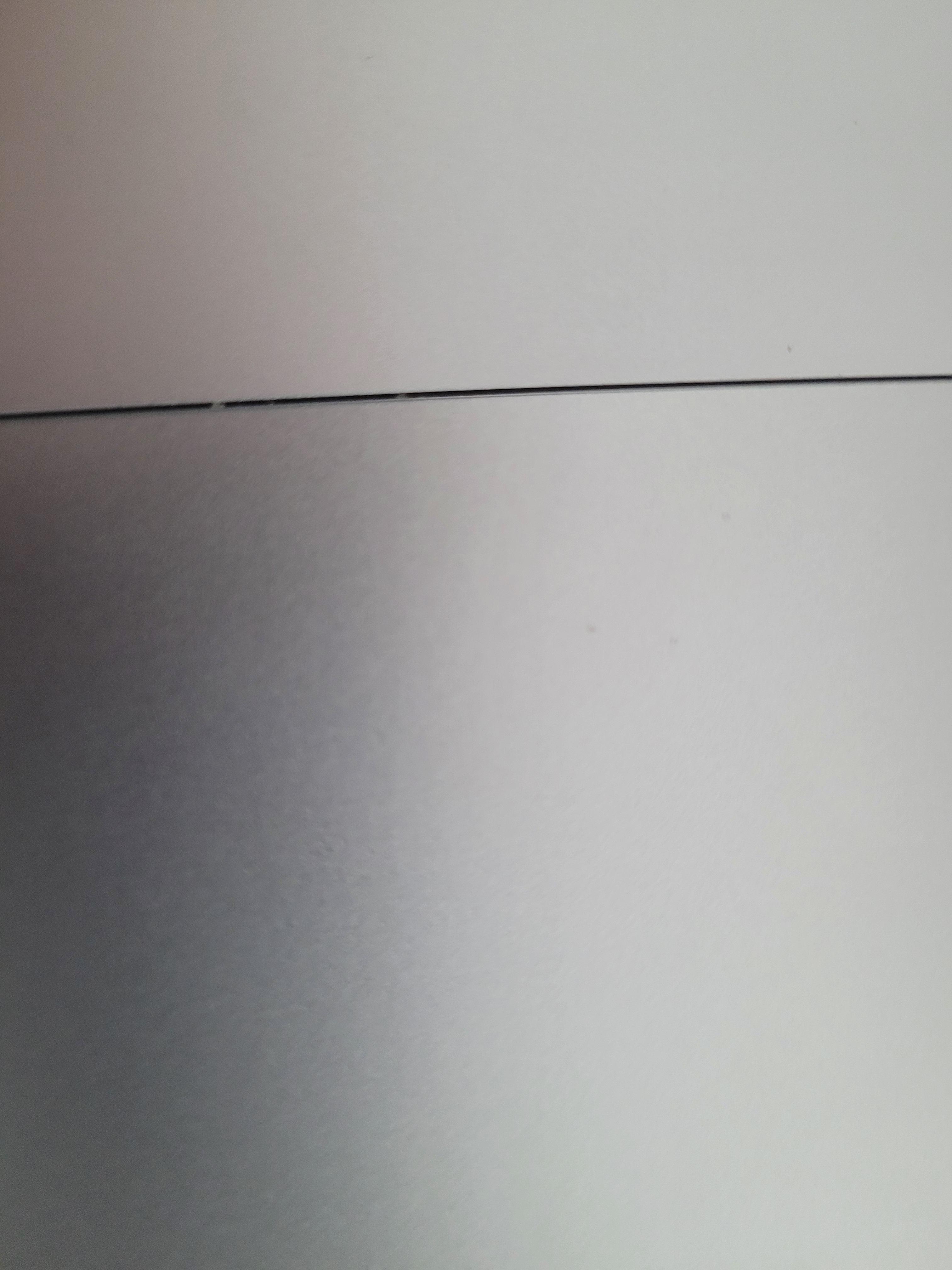 How to clean and remove these from my trackpad? r/macbookpro