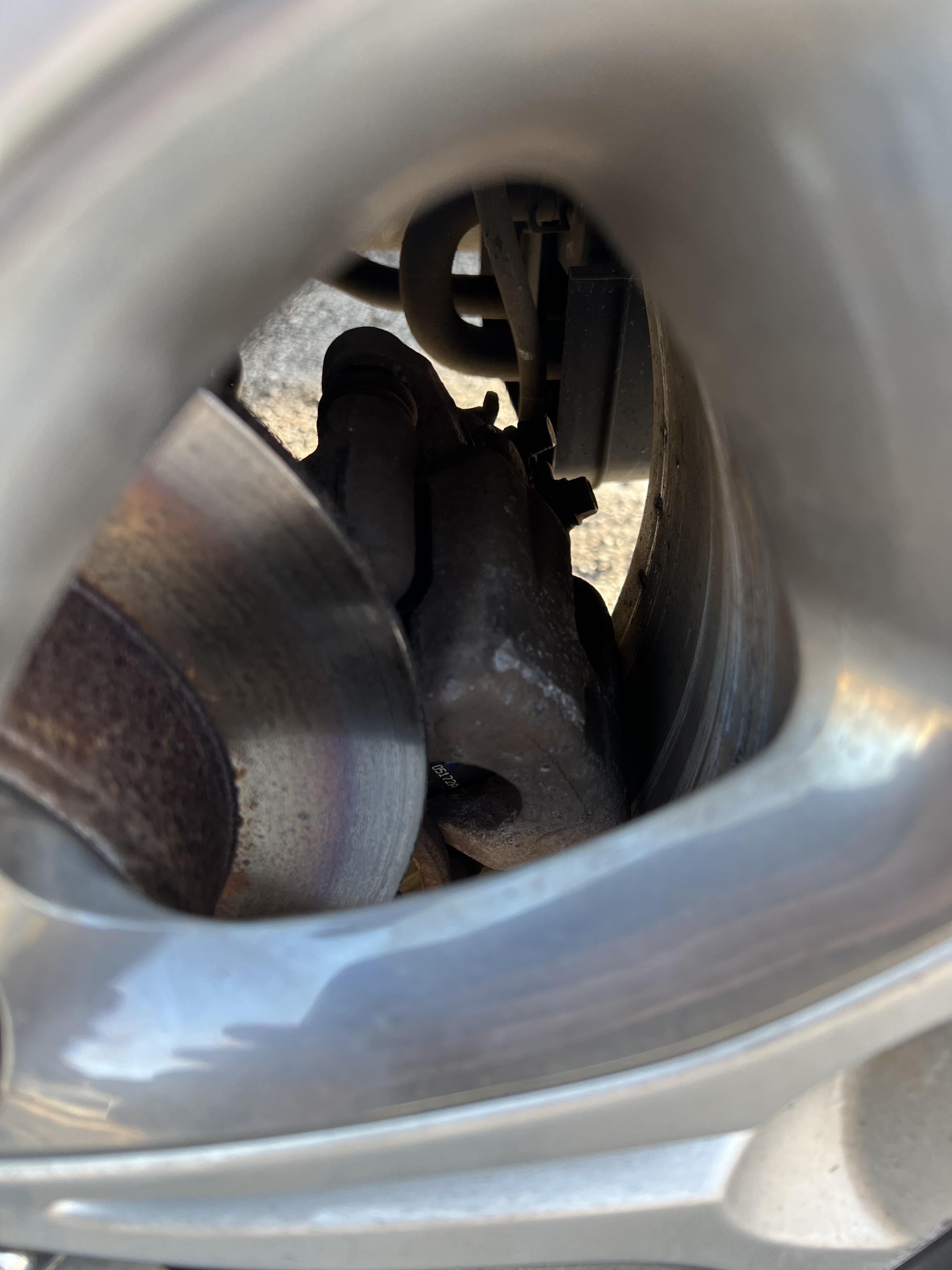 Caliper fell off after having pads replaced and rotor resurfaced by