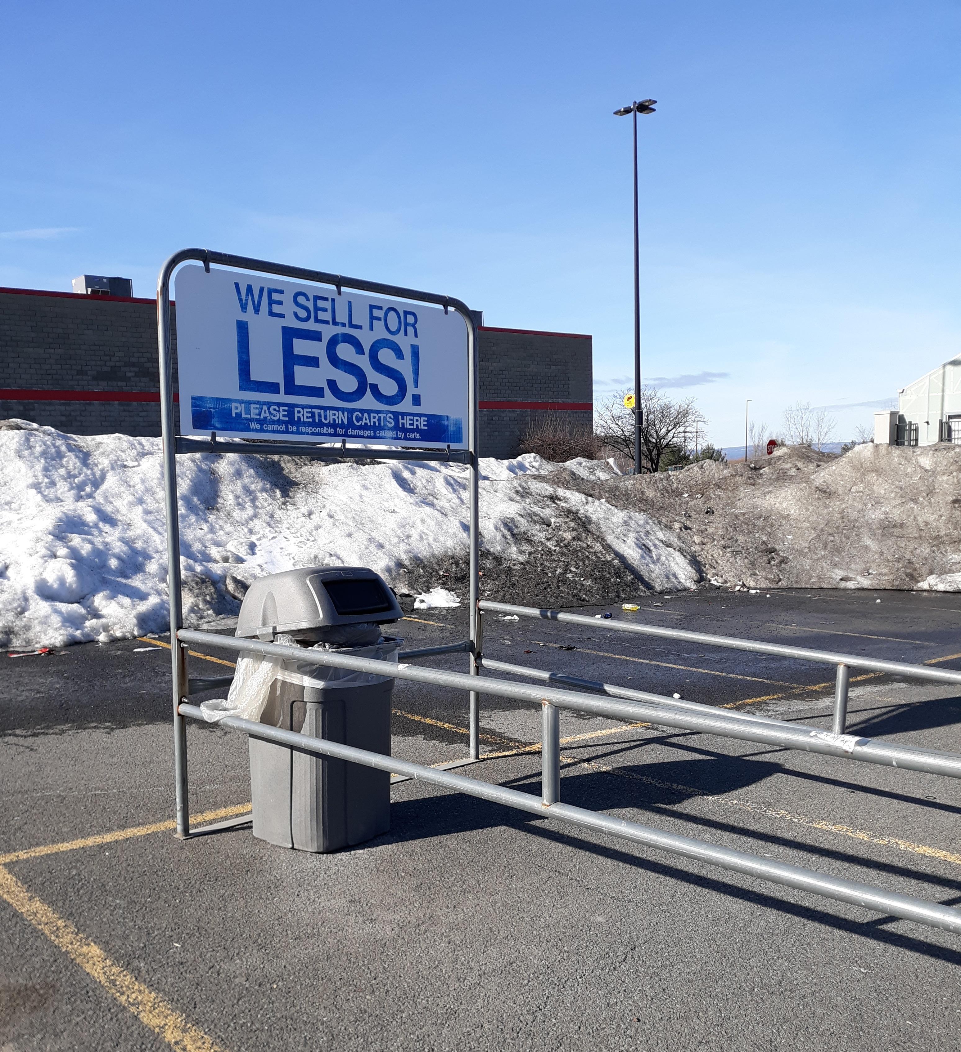 [OC] Cart Corral With "We Sell for Less!" Placard at Walmart 1940 in