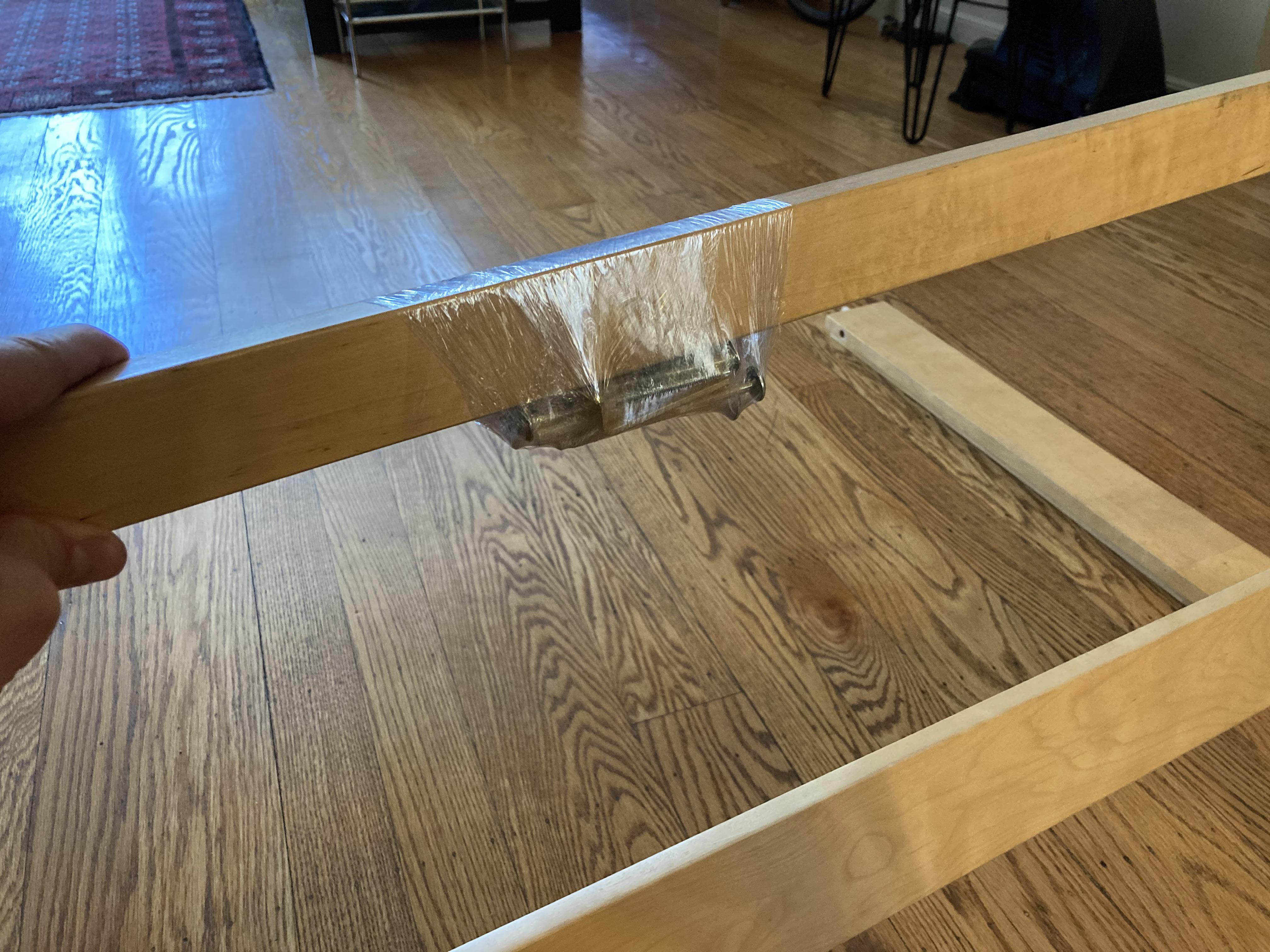 If you’re moving or storing some furniture, use cling wrap to make a