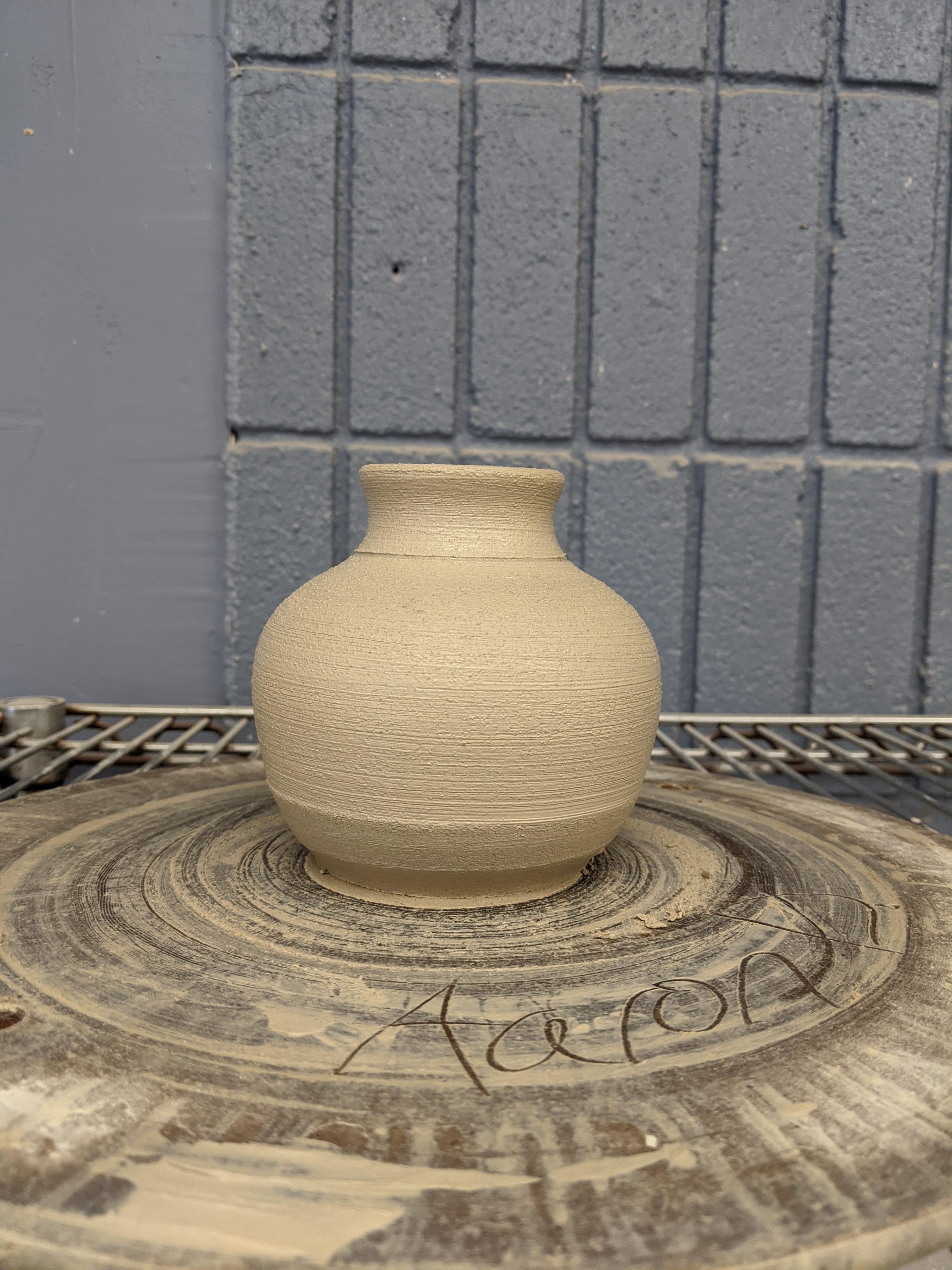 I made my first vase on the wheel! r/Ceramics
