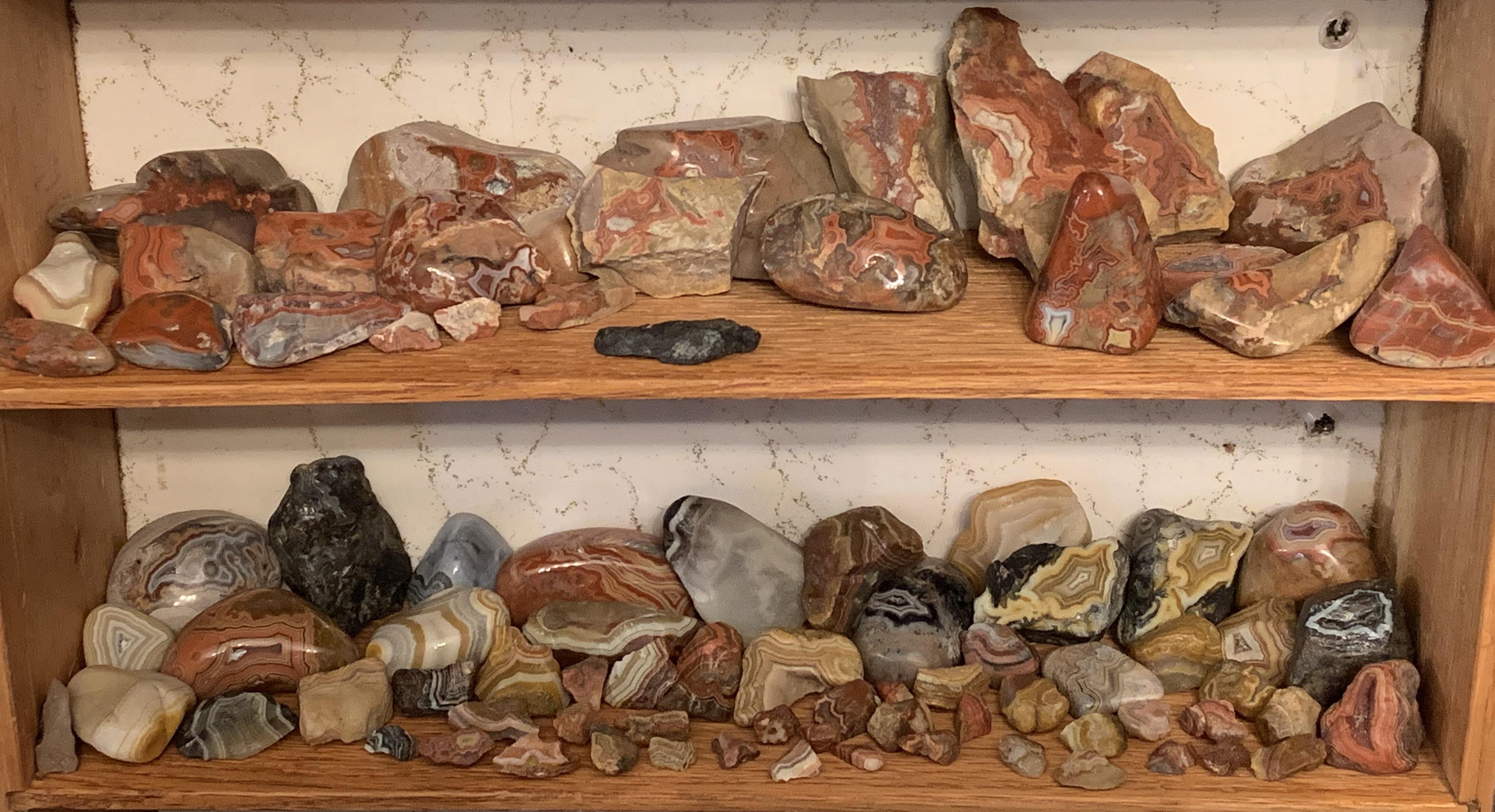 South Dakota rocks!!! Bottom shelf are true prairie fairburns. Top shelf are hills\ tepee canyon