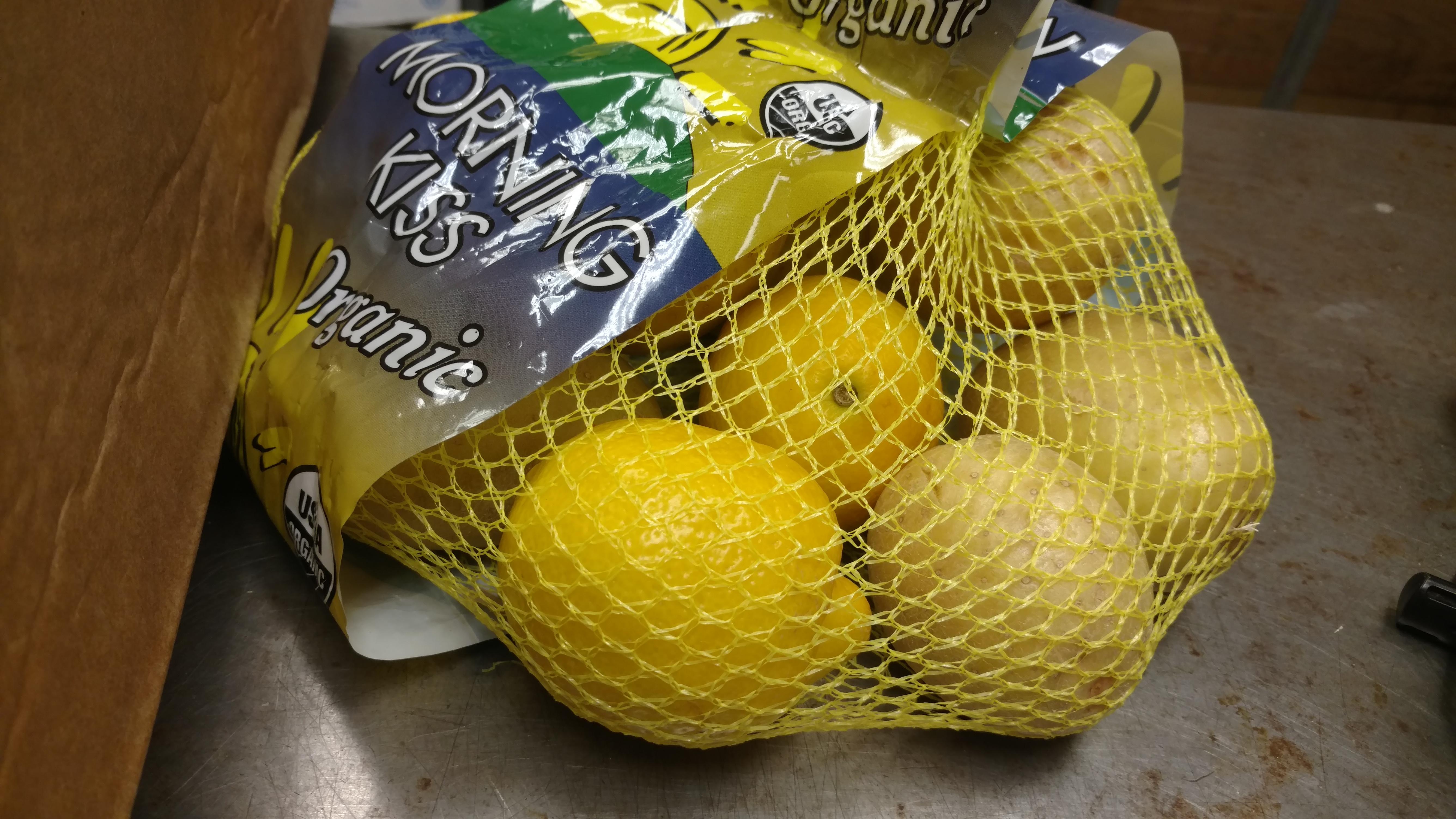There are lemons in this completely sealed bag of potatoes r
