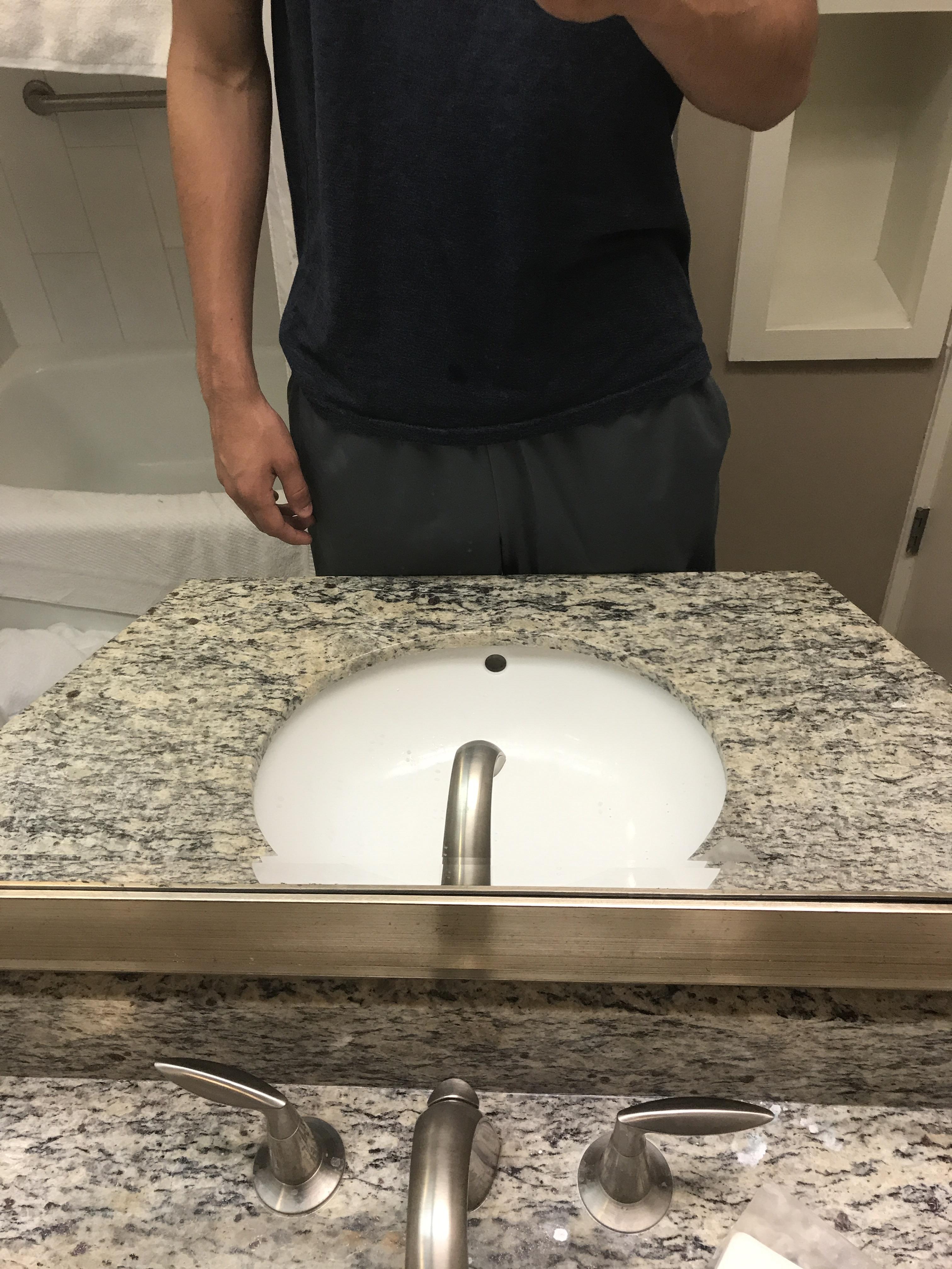 A bathroom sink at a hotel I'm staying at (6' 2") r/tall