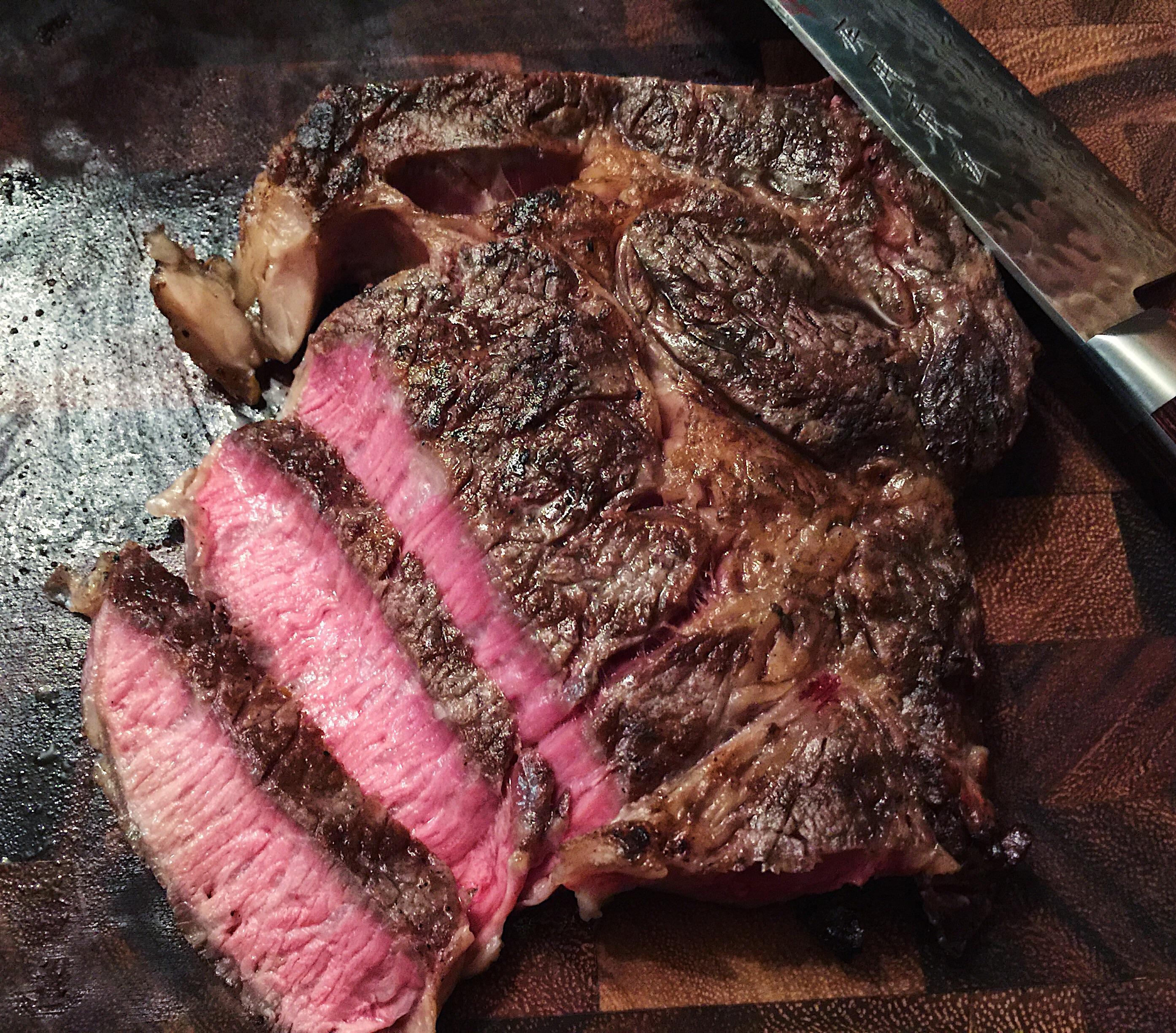 Ribeye grilled over lump charcoal steak