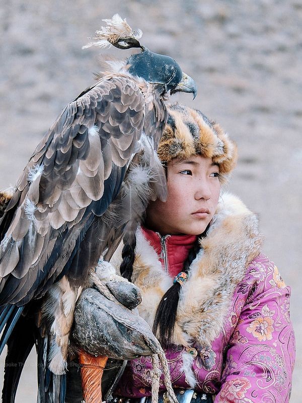 Young Kazakh female hunter on the annual Golden Eagle Festival in
