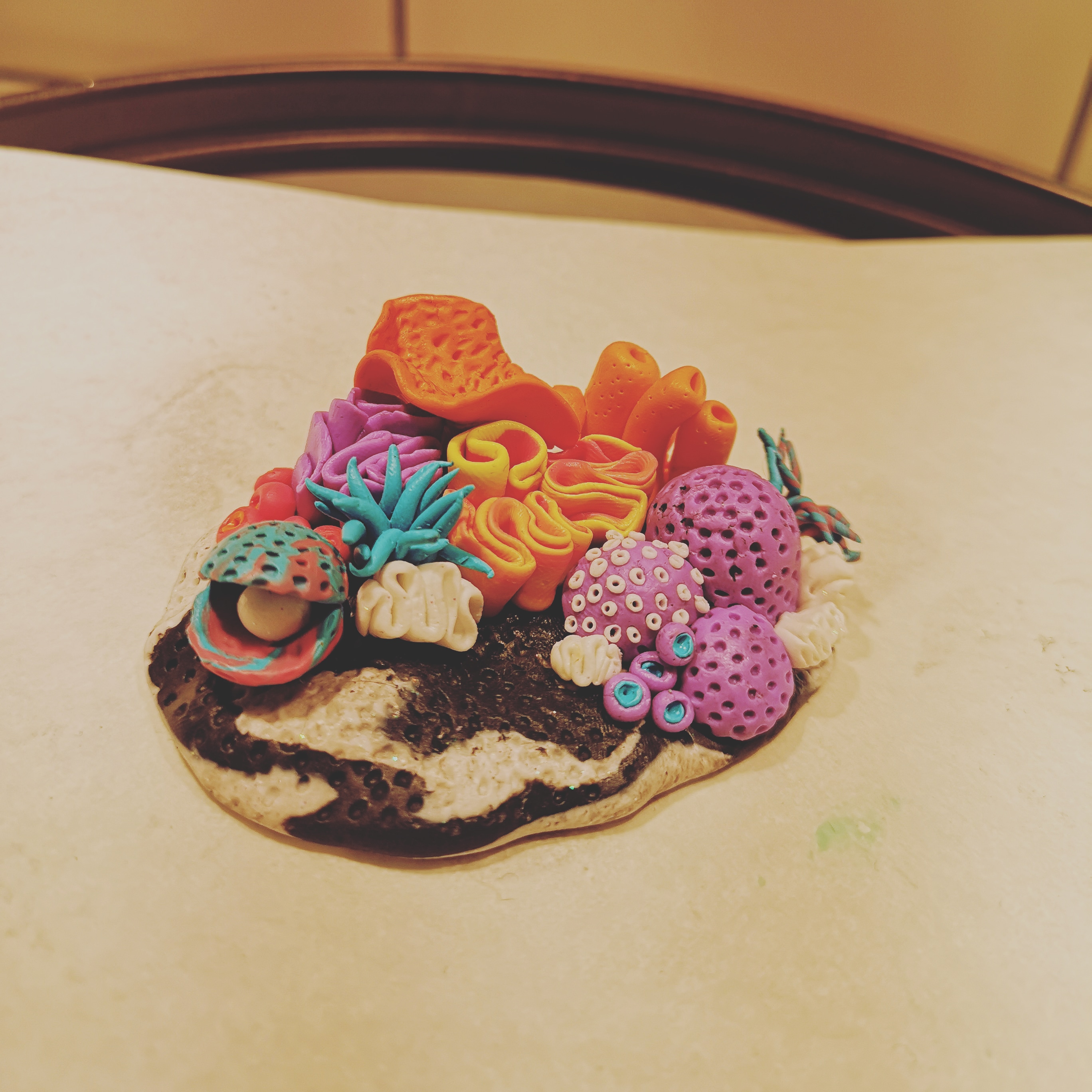 A polymer clay coral insert finished. r/Aquariums