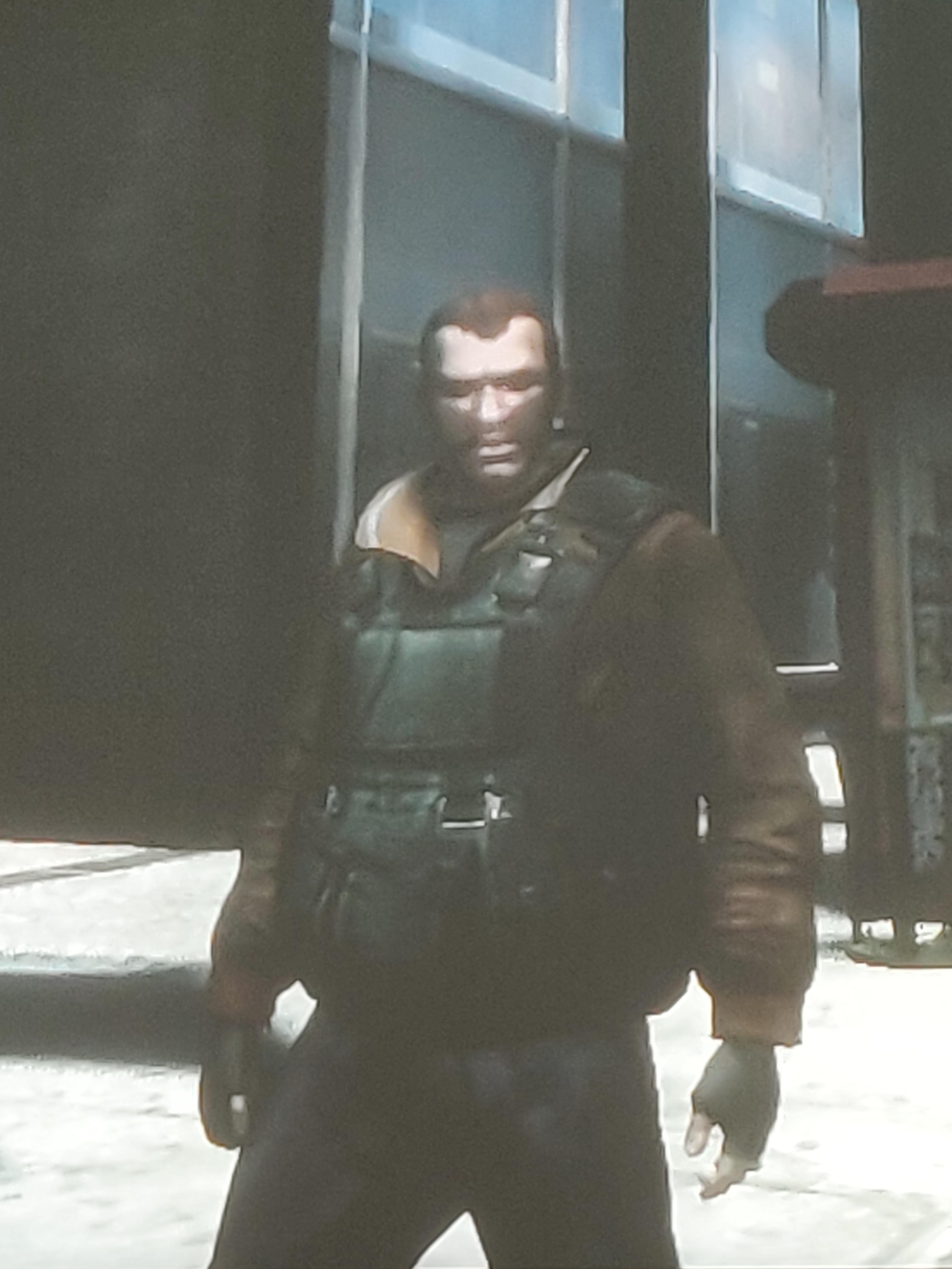 Niko with his beta hair, unused gloves, and the unused body armor r/GTAIV