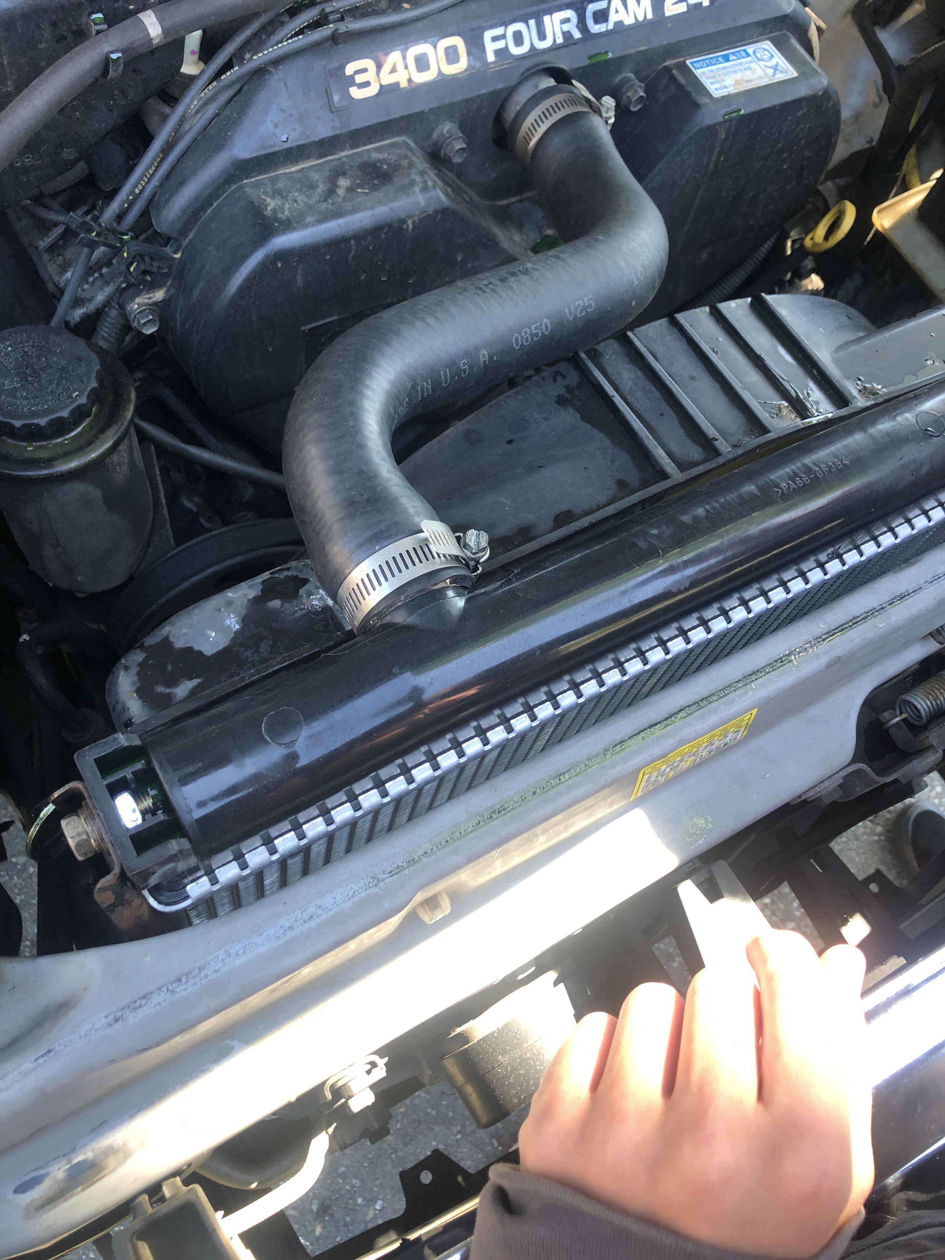 Radiator hose came detached on long car ride after I just replaced my radiator check engine