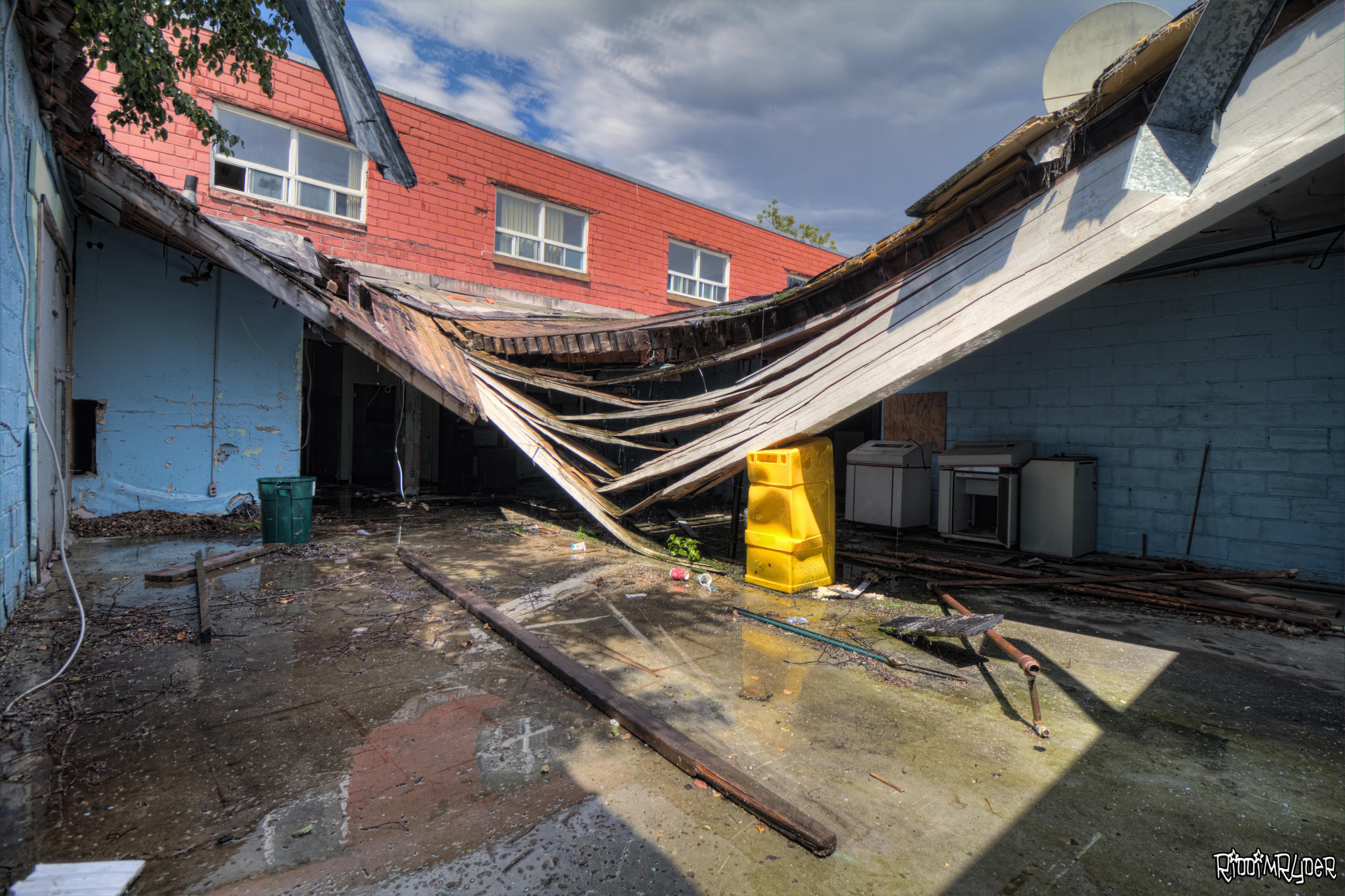 A Caved in Roof at An Abandoned Newspaper Building That is Being Held