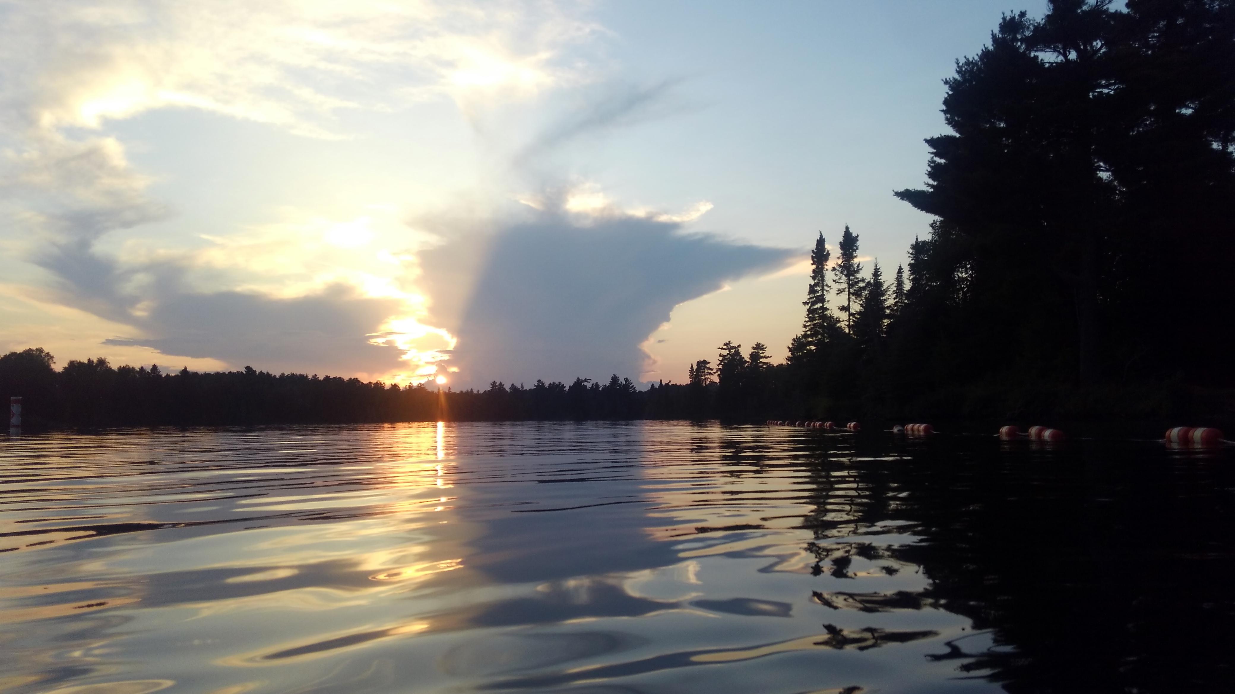 Minnesota shaped cloud at sunset, over this Minnesota lake. Just got
