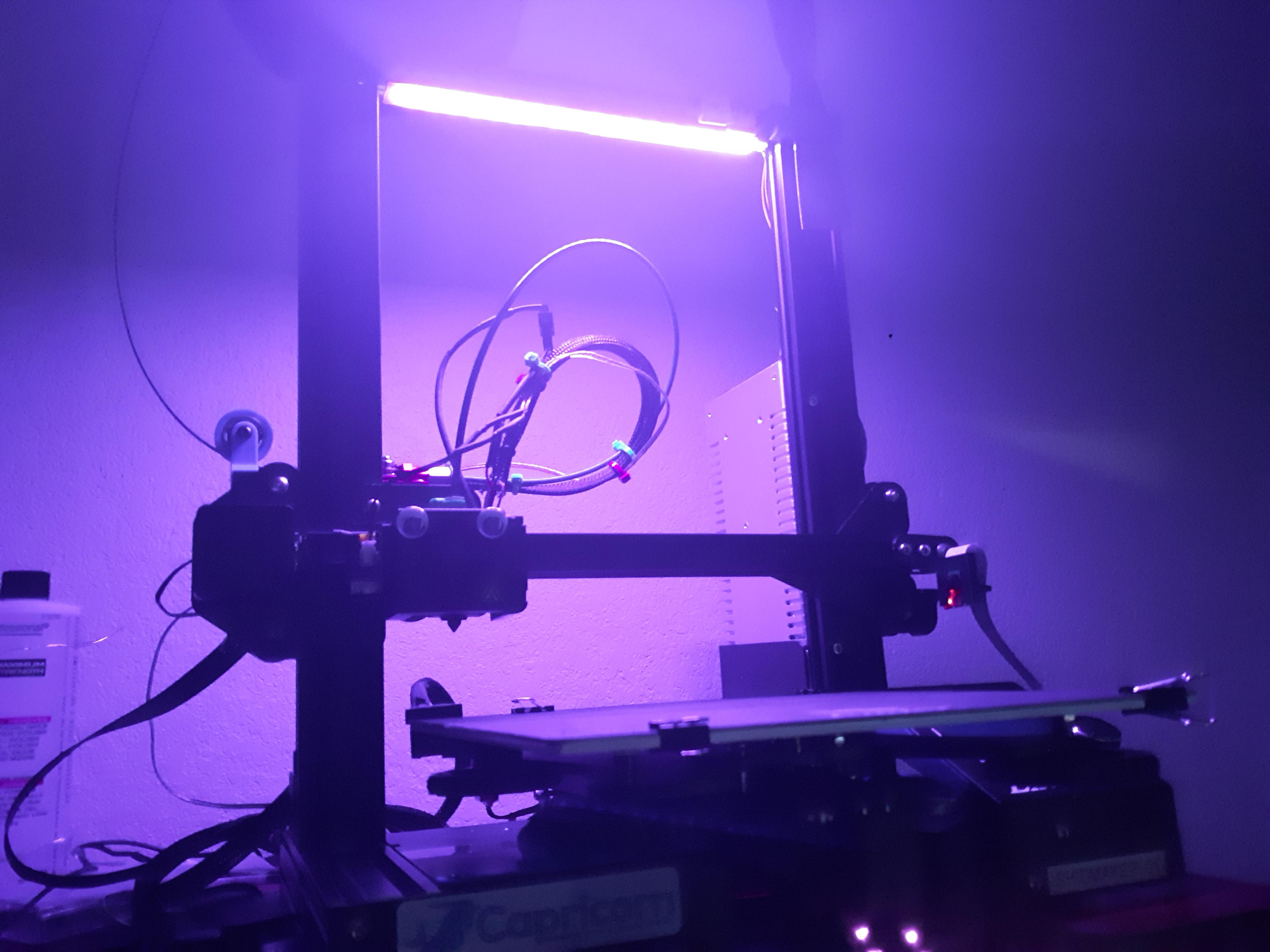 Custom integrated light bar. Took a cheap 5v LED lamp, slid the stiff