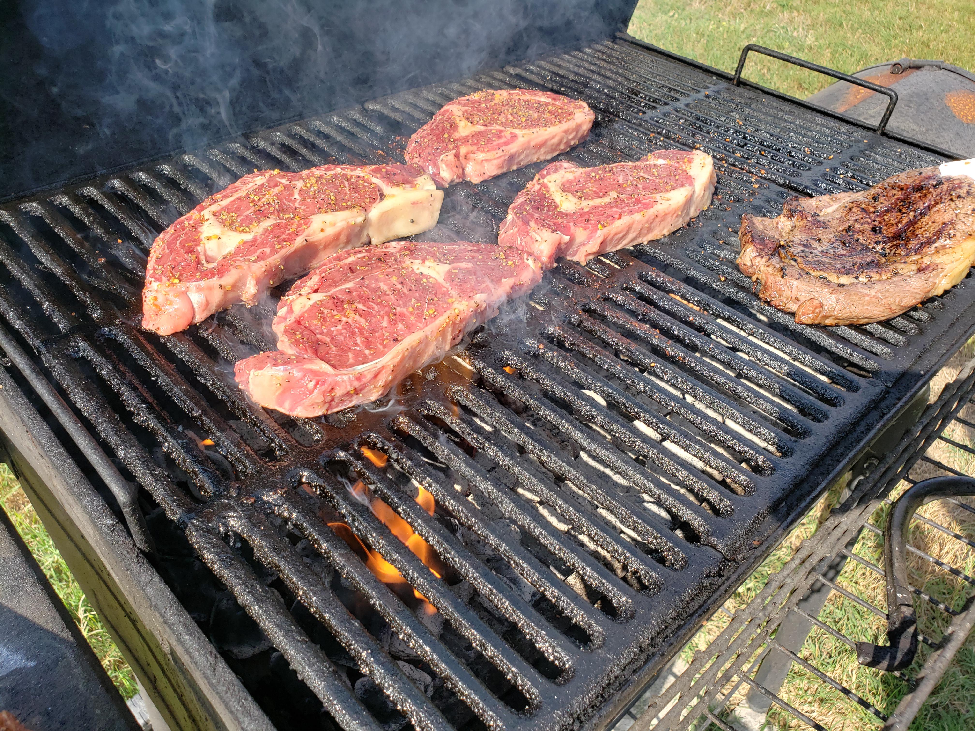 Ribeyes roasting on an open fire! r/grilling